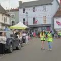 A couple of marshalls wait for the parade, Saxtead Mill, Framlingham Gala and Chips on the Beach, Aldeburgh - 27th May 2024