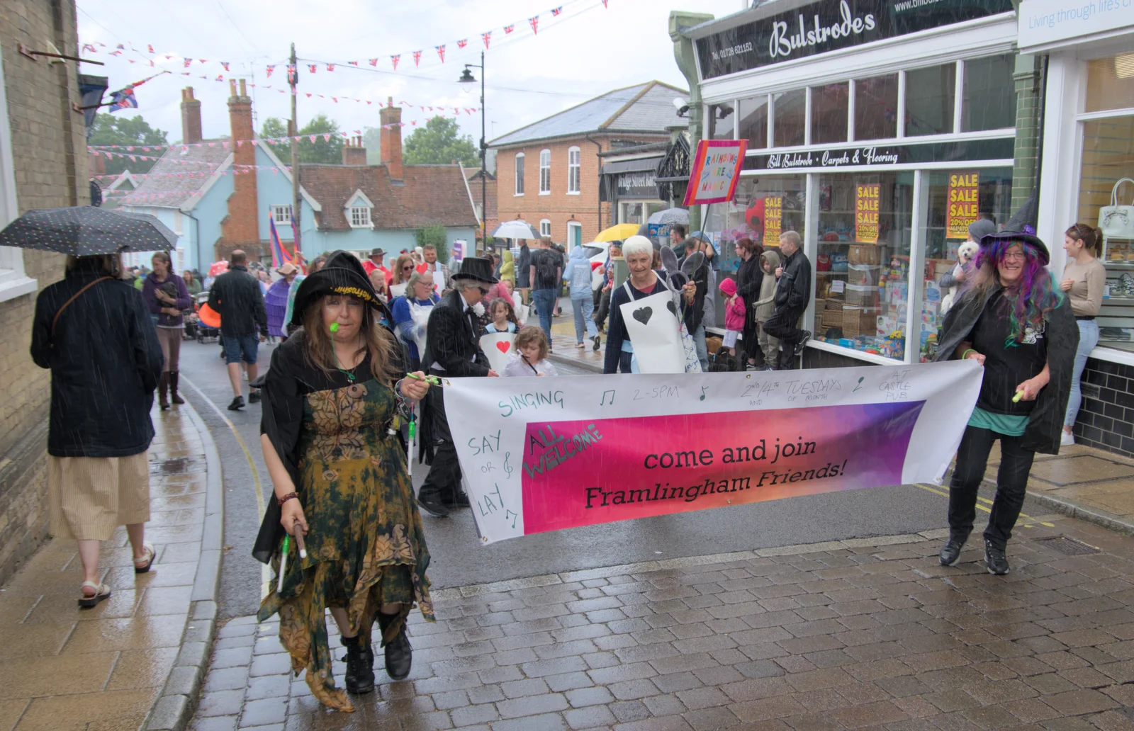 The parade trundles past Bulstrode's, from Saxtead Mill, Framlingham Gala and Chips on the Beach, Aldeburgh - 27th May 2024