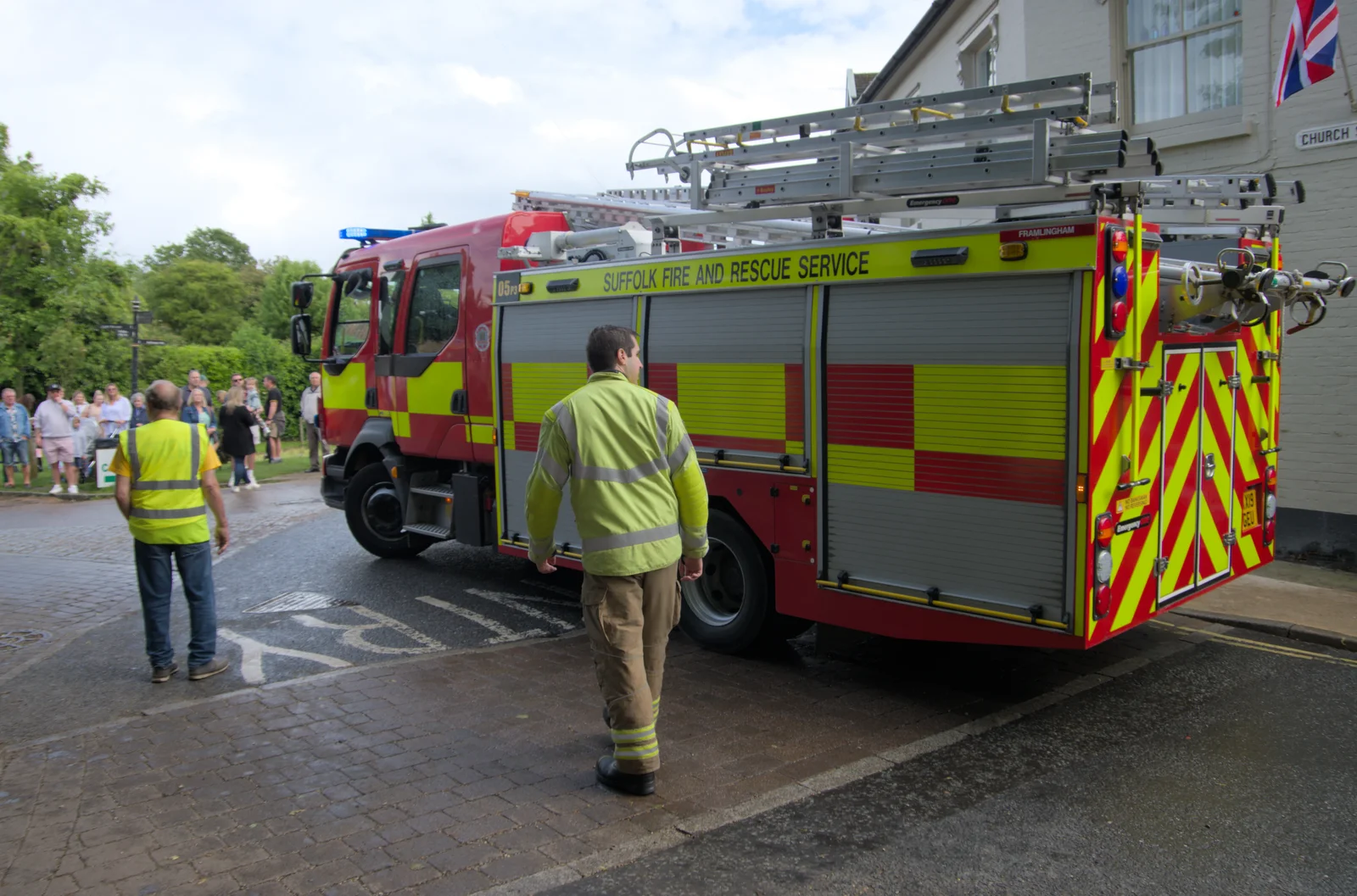 Suffolk Fire Service's engine is reversed, from Saxtead Mill, Framlingham Gala and Chips on the Beach, Aldeburgh - 27th May 2024