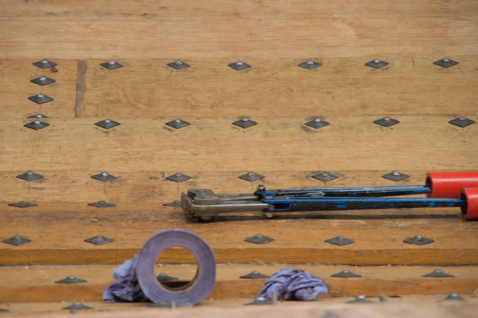 Oak strakes are held together with iron rivets, from The Sutton Hoo Ship Reconstruction, The Longshed, Woodbridge - 29th May 2024