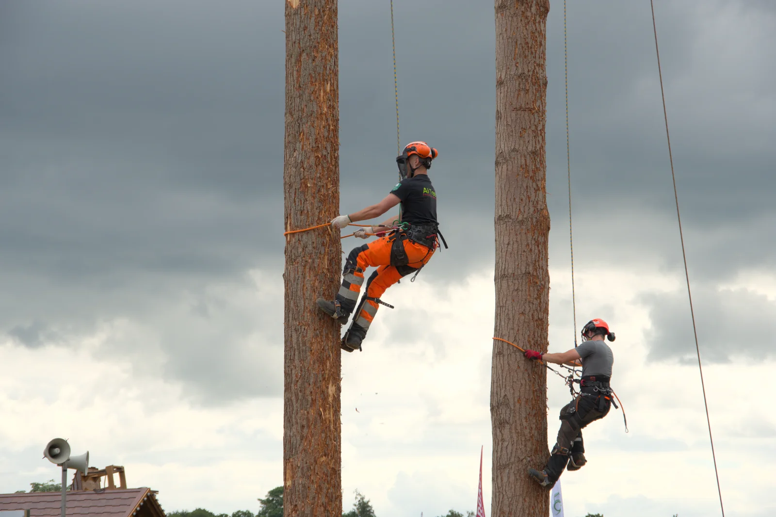 A climbing-up-a-log contest ensues, from Fred and the SYWO at the Suffolk Show, Trinity Park, Ipswich - 30th May 2024