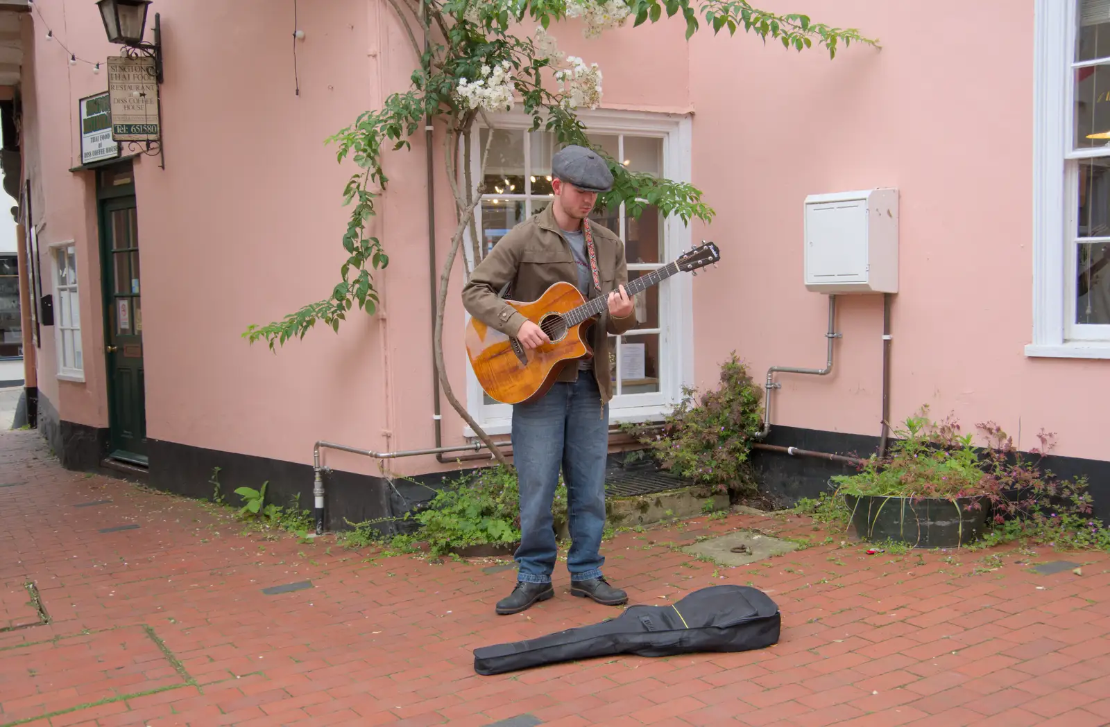 Lewis pretends to play guitar in Norfolk Yard, from A "Once" Photoshoot, Diss, Norfolk - 8th June 2024