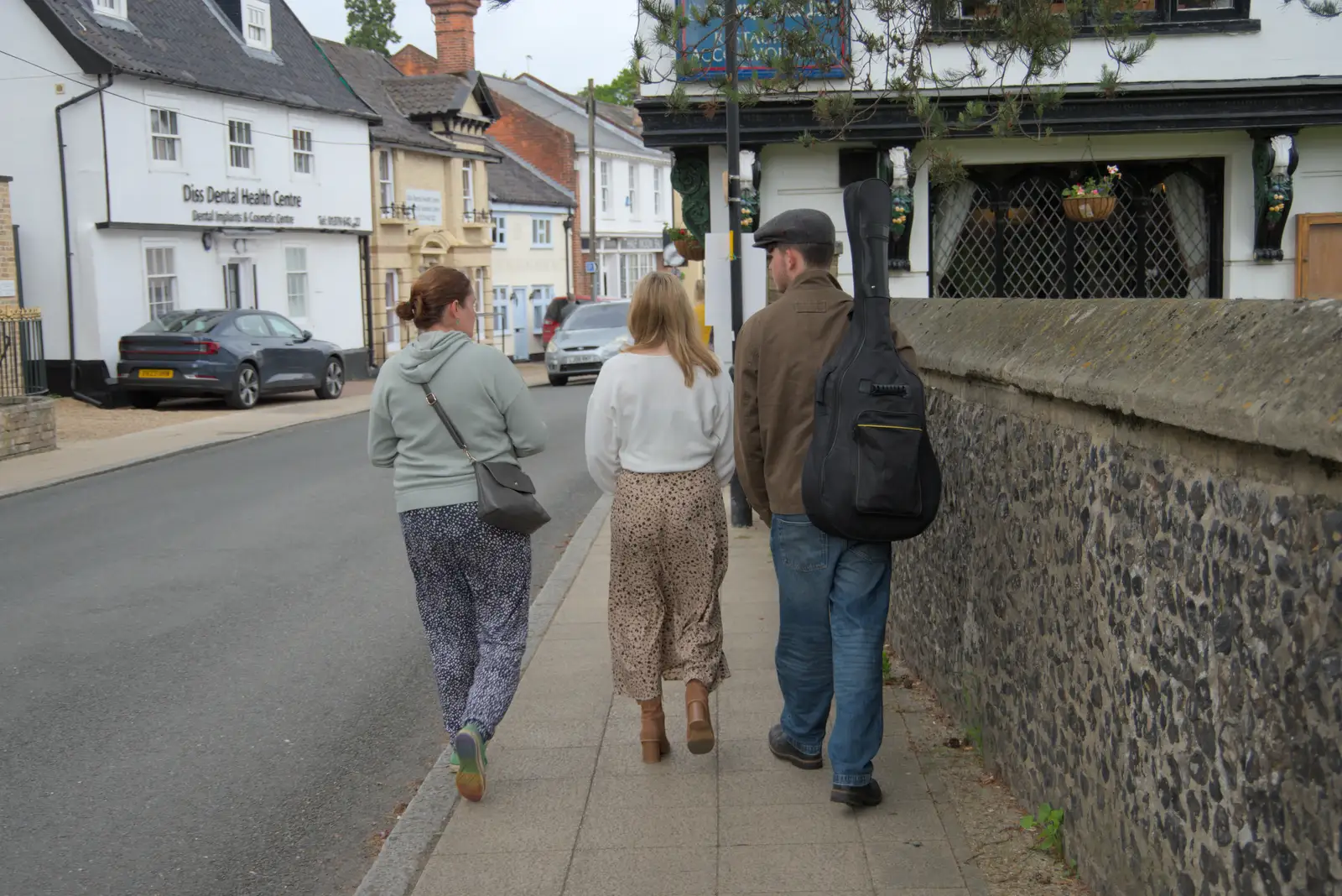 Walking up Mount Street past the Saracen's Head, from A "Once" Photoshoot, Diss, Norfolk - 8th June 2024