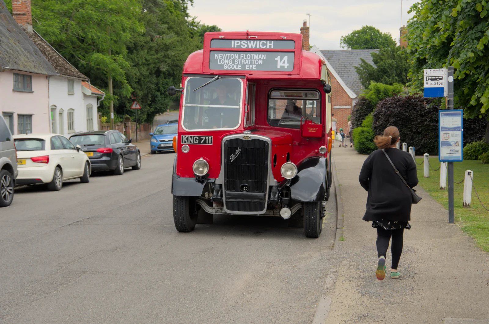 Isobel runs to catch the bus, from Open Gardens, Eye, Suffolk - 9th June 2024