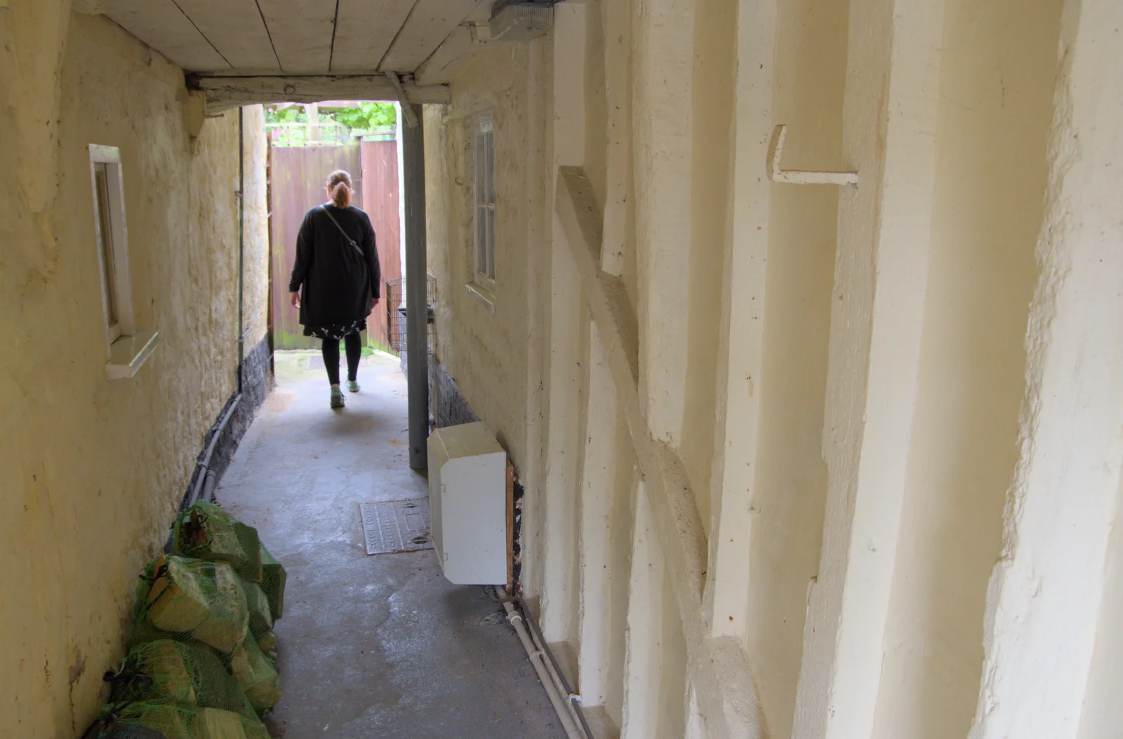 Isobel wanders up a secret alley, from Open Gardens, Eye, Suffolk - 9th June 2024