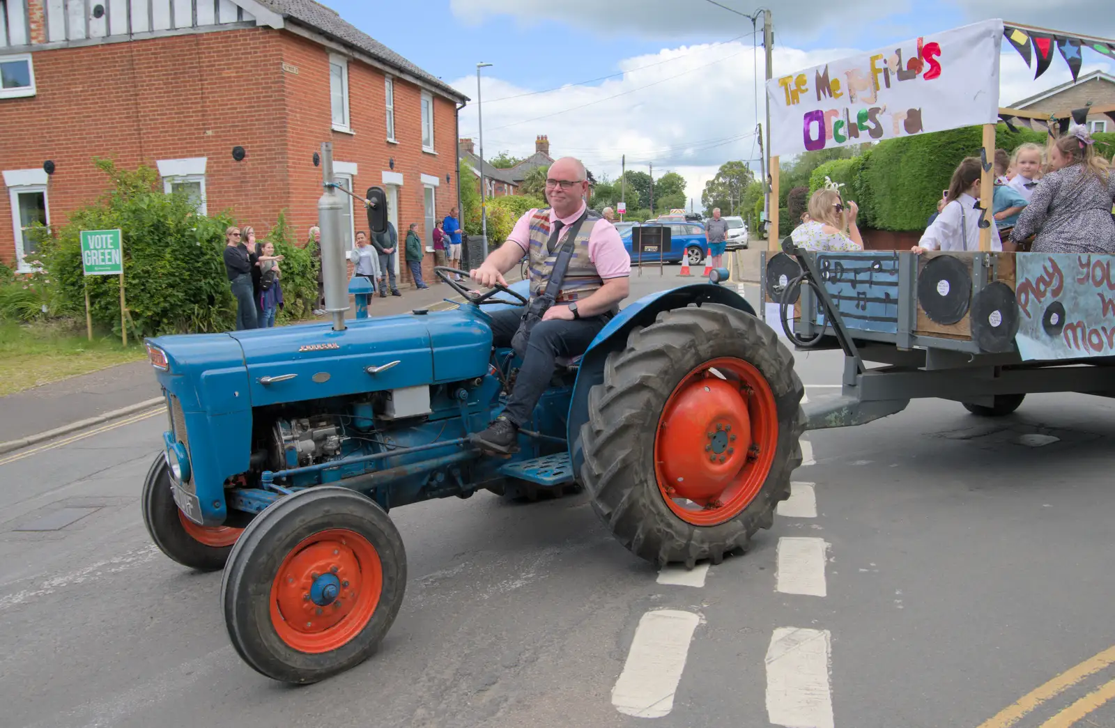 A Fordson Major turns out onto Shelfanger Road, from The Carnival Procession, Diss, Norfolk - 16th June 2024