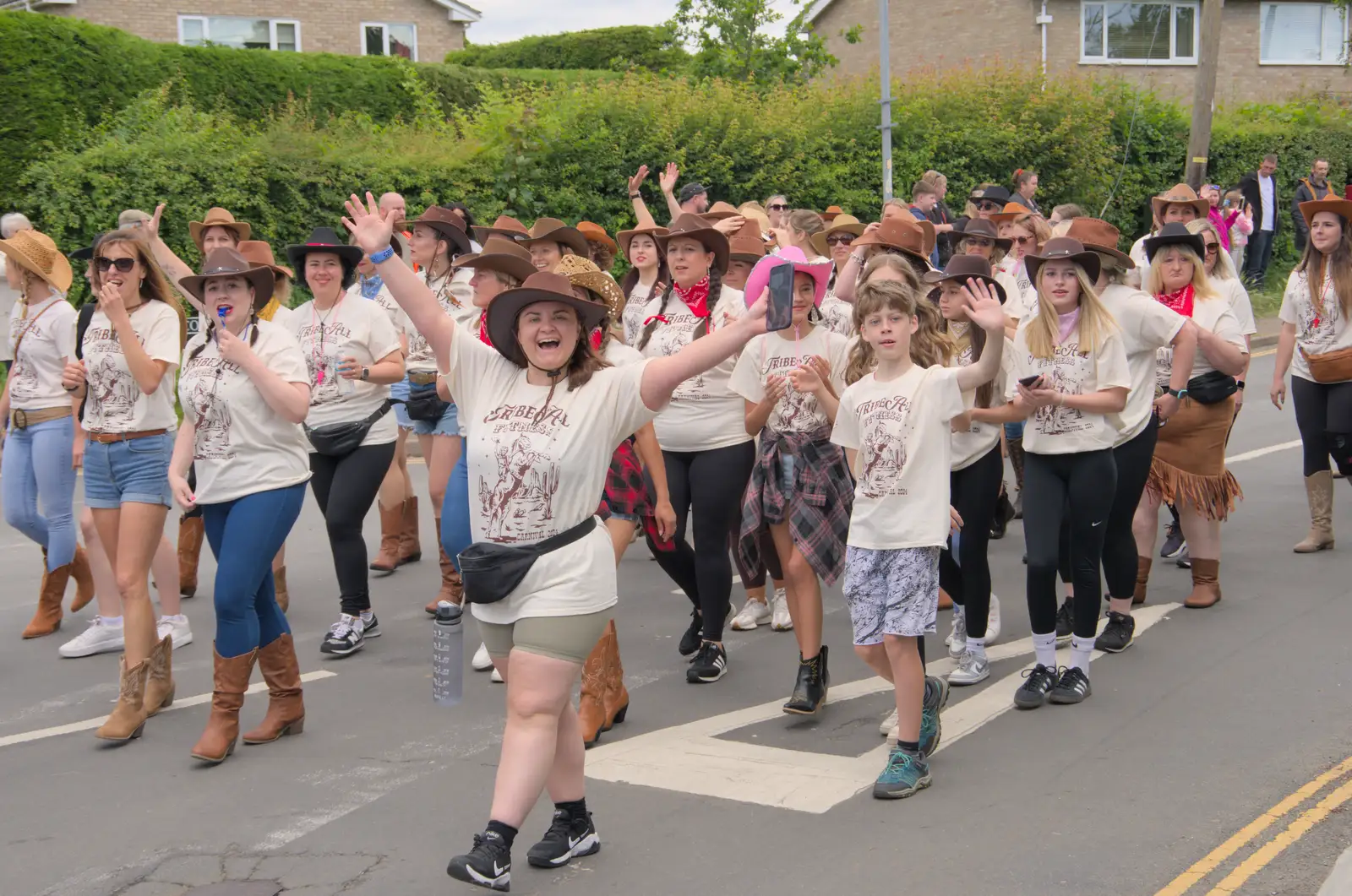 The Tribe All gang gives a wave, from The Carnival Procession, Diss, Norfolk - 16th June 2024