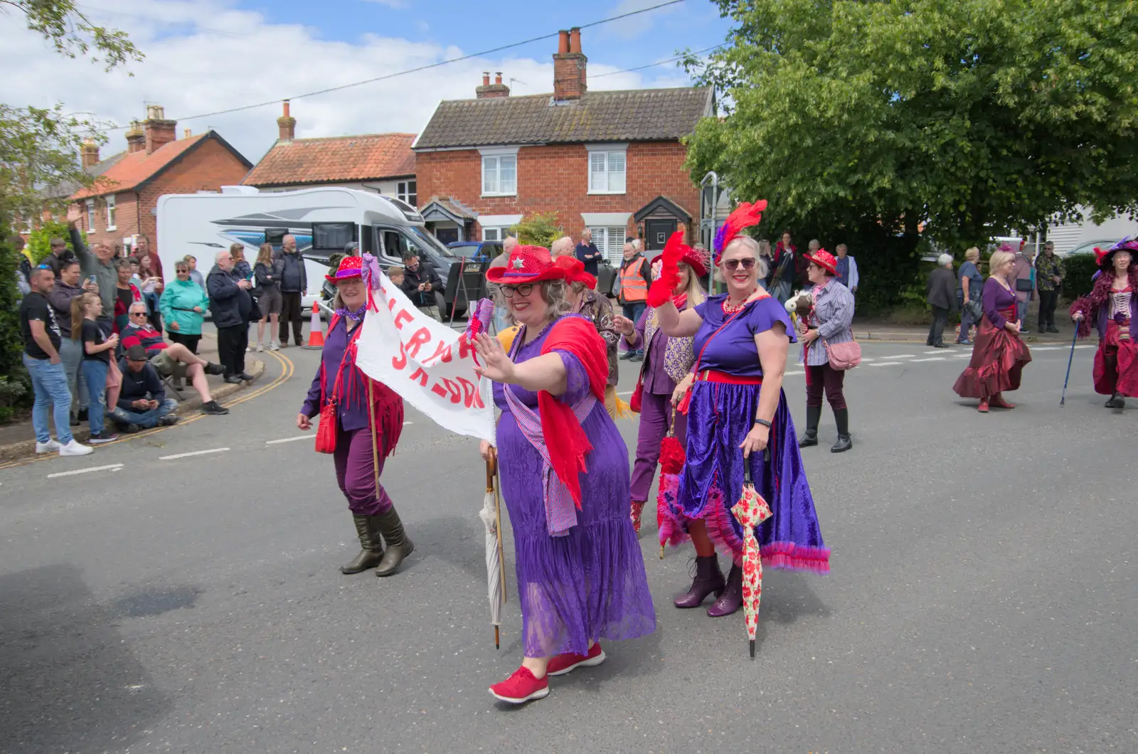 A very purple group passes by, from The Carnival Procession, Diss, Norfolk - 16th June 2024