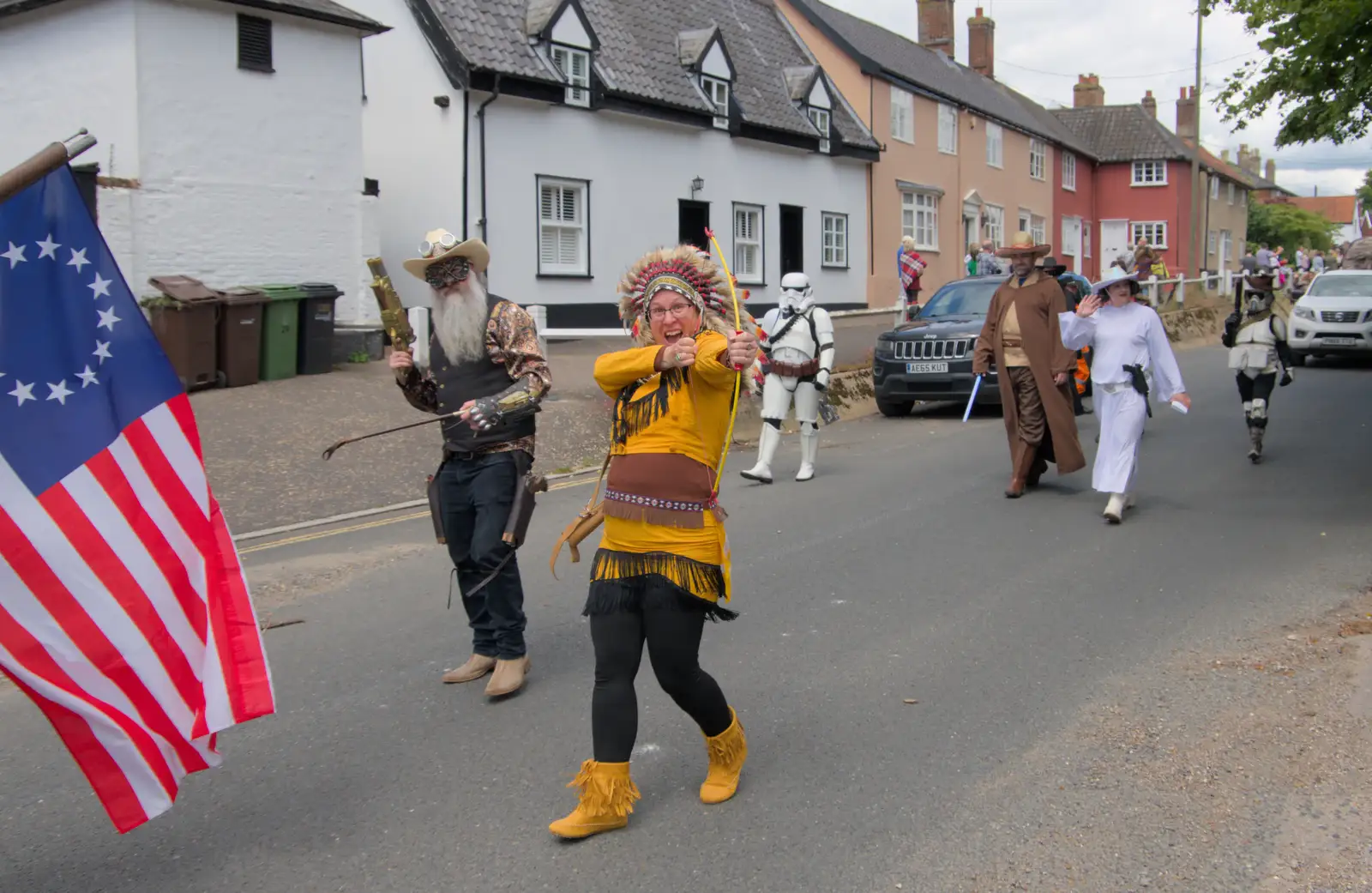 A 'native American' with a bow and arrow, from The Carnival Procession, Diss, Norfolk - 16th June 2024