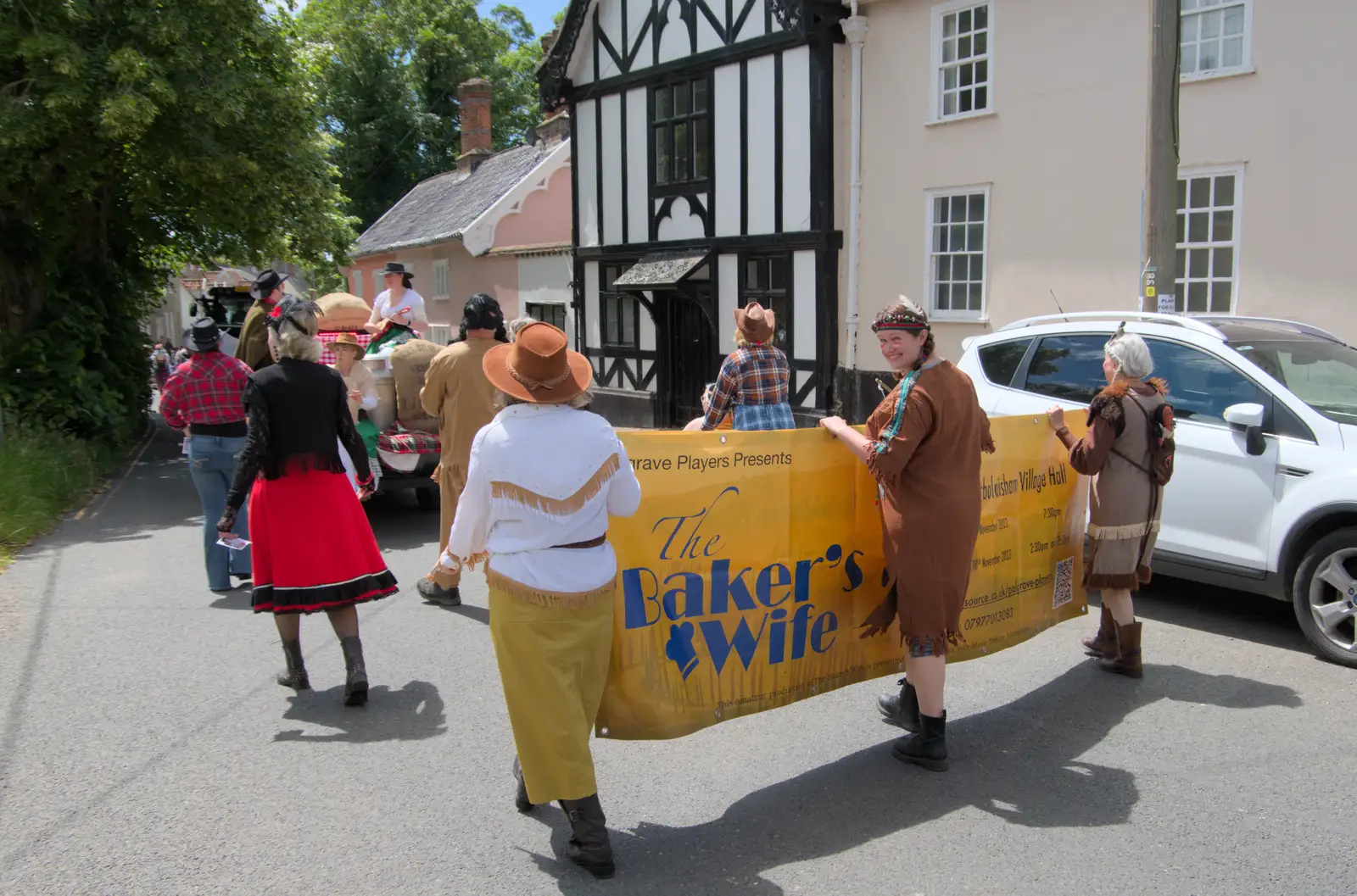 Isobel and the Baker's Wife banner, from The Carnival Procession, Diss, Norfolk - 16th June 2024