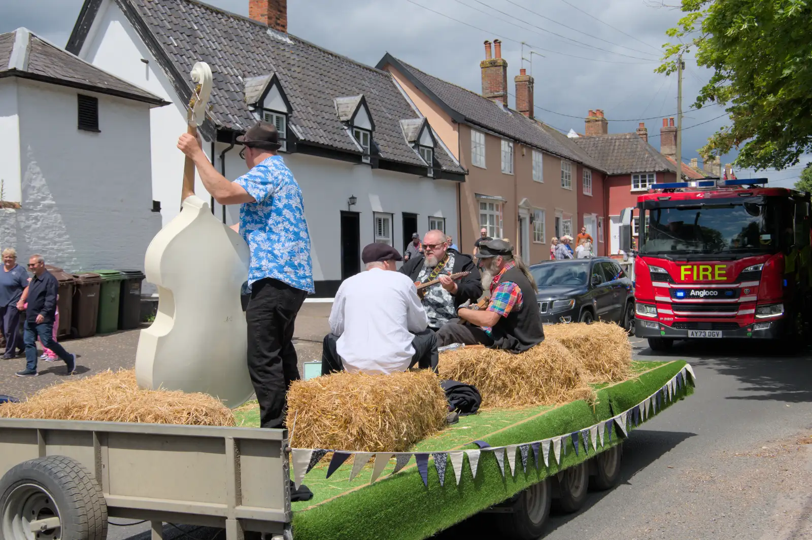 A pretend bluegrass band brings up the rear, from The Carnival Procession, Diss, Norfolk - 16th June 2024