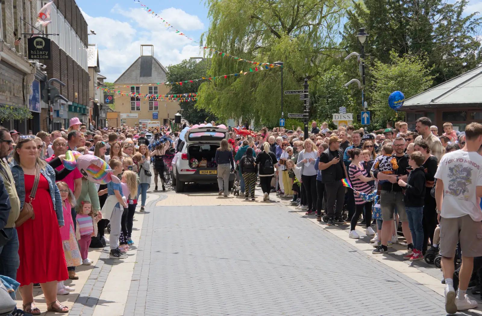 There's a big crowd at the bottom of Mere Street, from The Carnival Procession, Diss, Norfolk - 16th June 2024