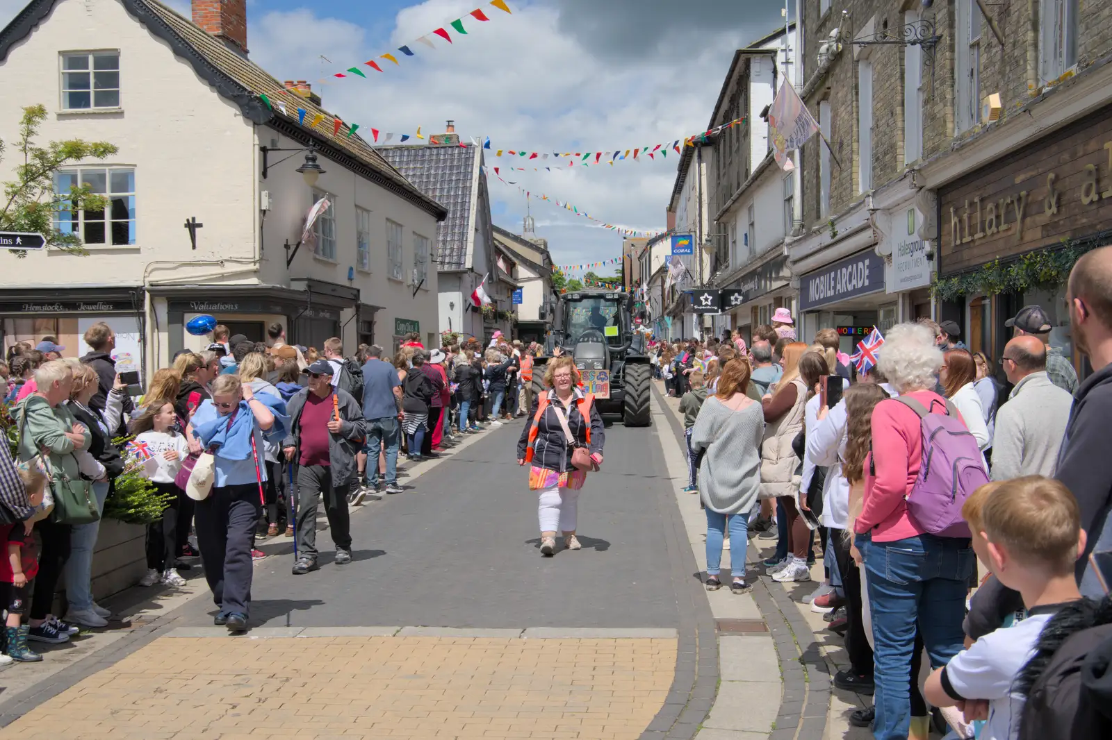 The parade snakes its way through town, from The Carnival Procession, Diss, Norfolk - 16th June 2024