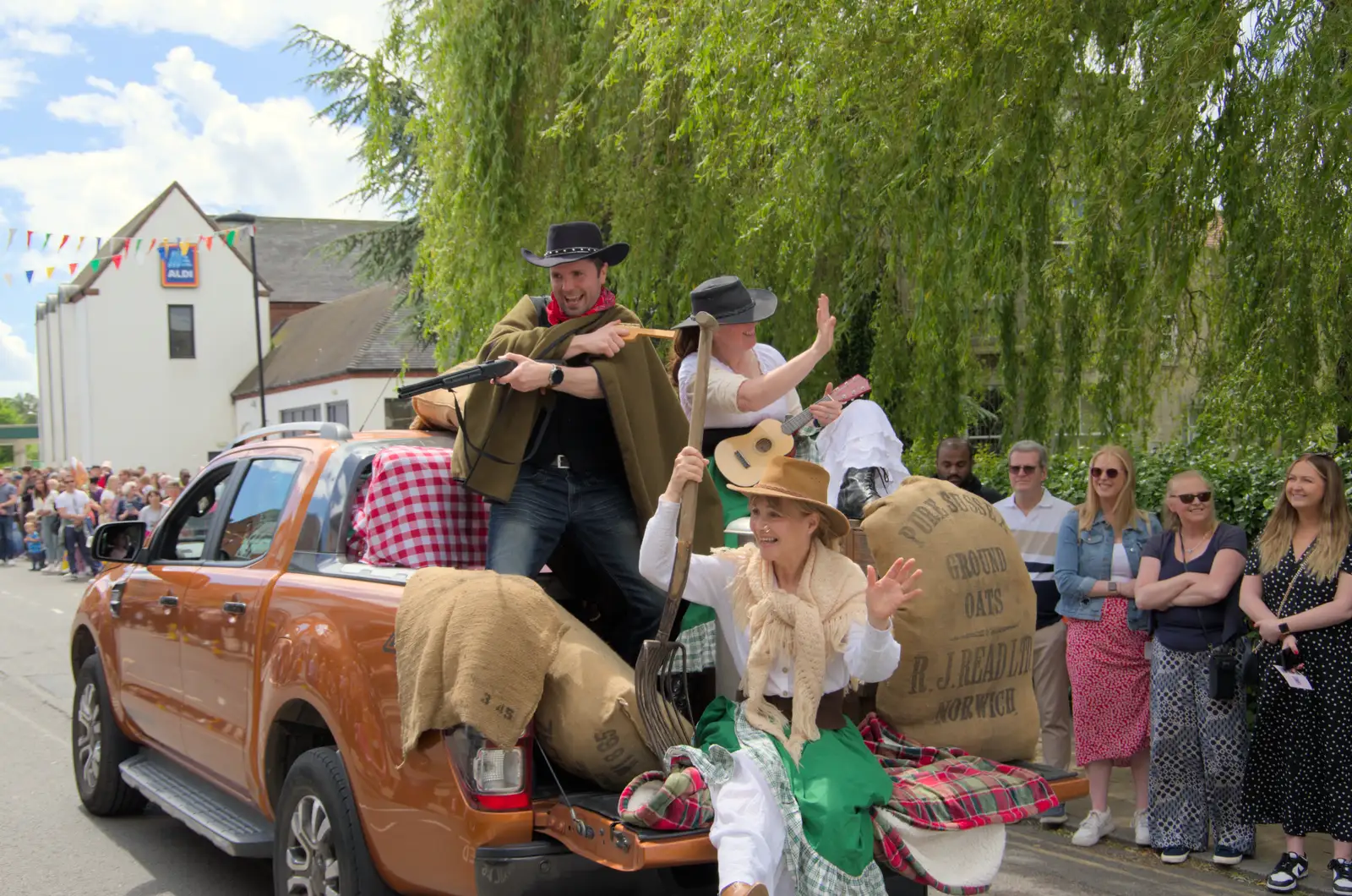 Cathal does some pretend shooting, from The Carnival Procession, Diss, Norfolk - 16th June 2024