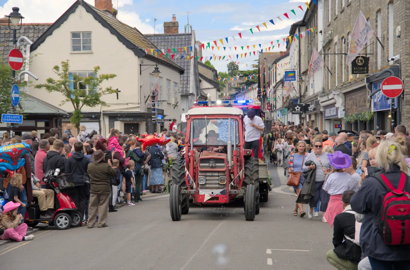 A tractor on Mere Street, from The Carnival Procession, Diss, Norfolk - 16th June 2024