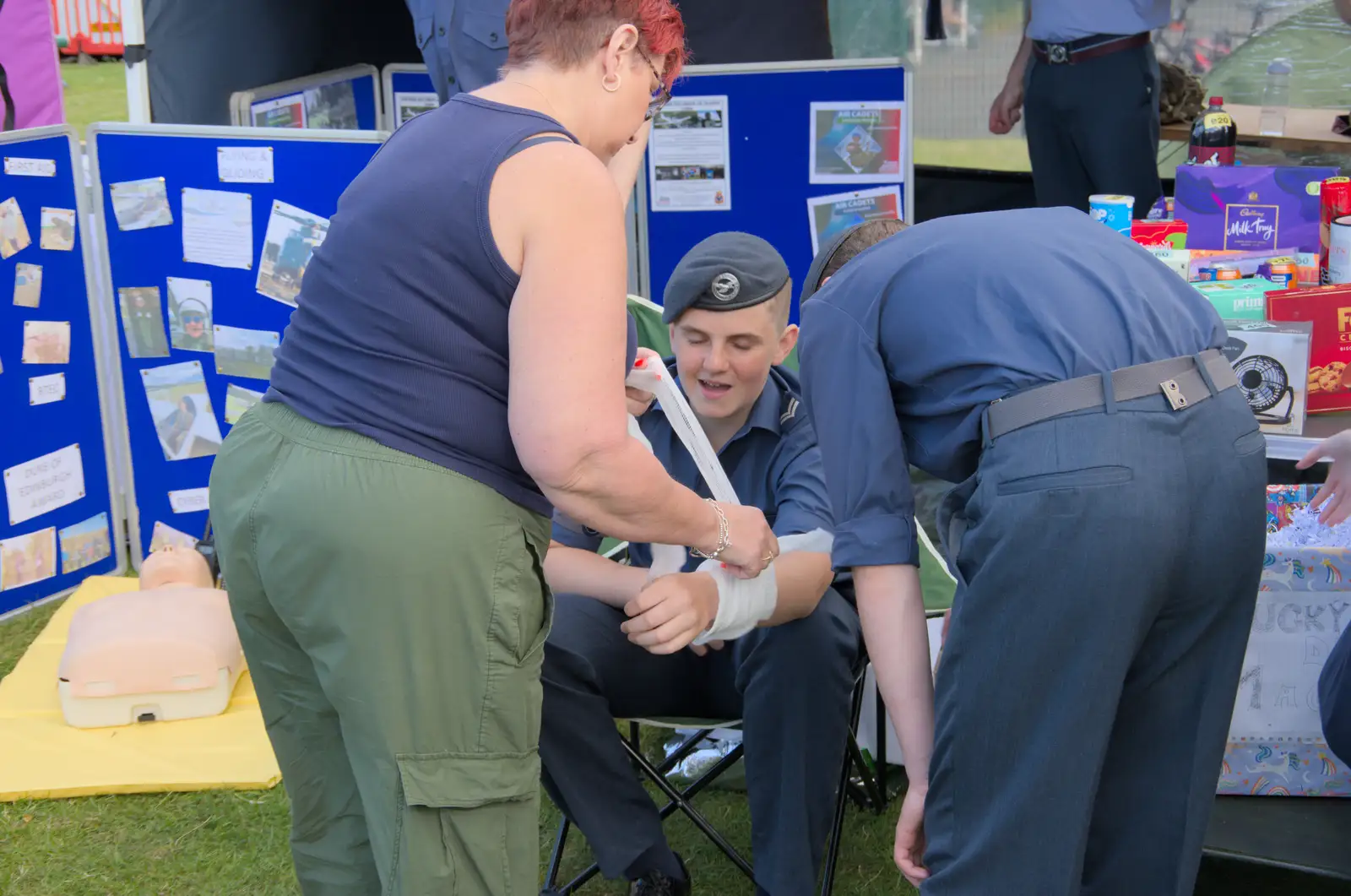 The cadets do a first-aid demonstration, from The Carnival Procession, Diss, Norfolk - 16th June 2024