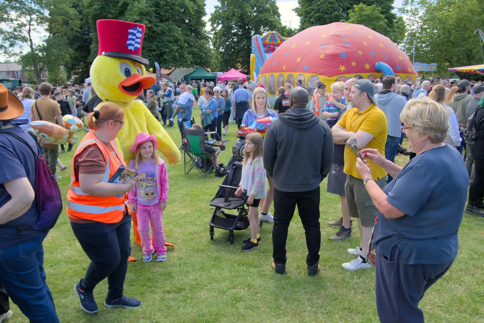 The Diss Mascot does the rounds for photos, from The Carnival Procession, Diss, Norfolk - 16th June 2024