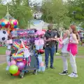 A tat-seller sells stuff, The Carnival Procession, Diss, Norfolk - 16th June 2024