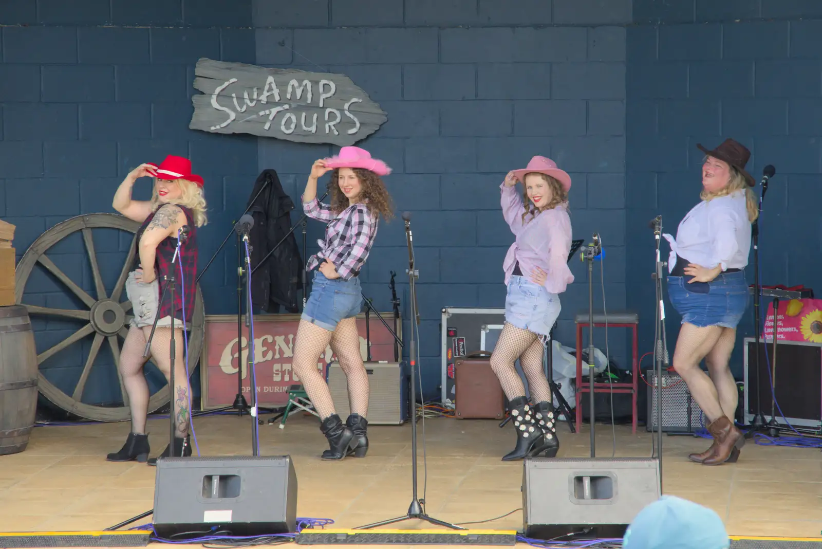 There's some sort of rodeo show on the pavillion, from The Carnival Procession, Diss, Norfolk - 16th June 2024