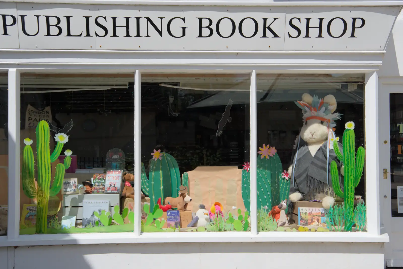 Diss Publishing's window is on-theme, from The Carnival Procession, Diss, Norfolk - 16th June 2024