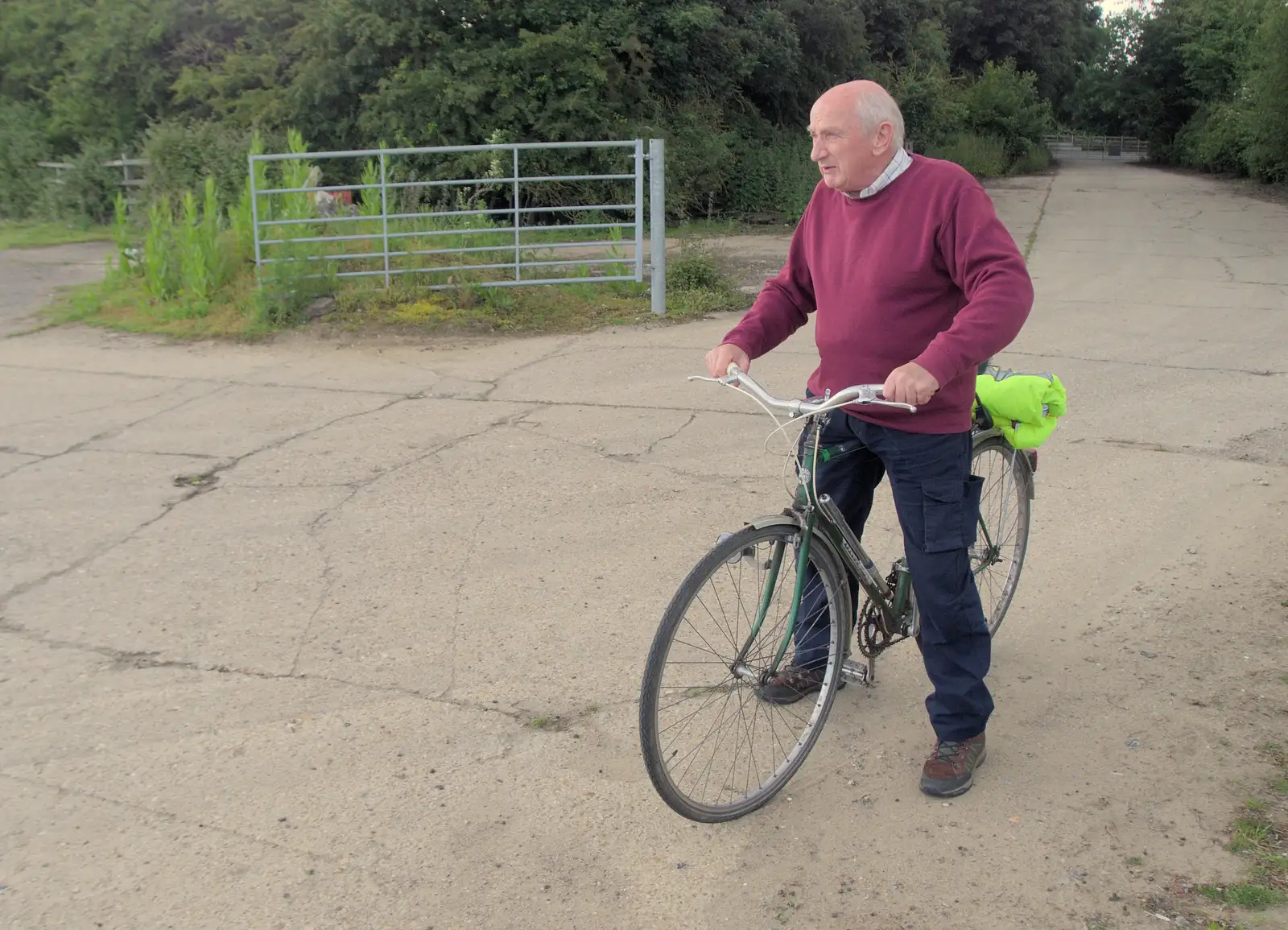 Mick pauses before we head across the airfield, from Mama Afrika, and Richard Hawley at the UEA, Norwich - 16th June 2024