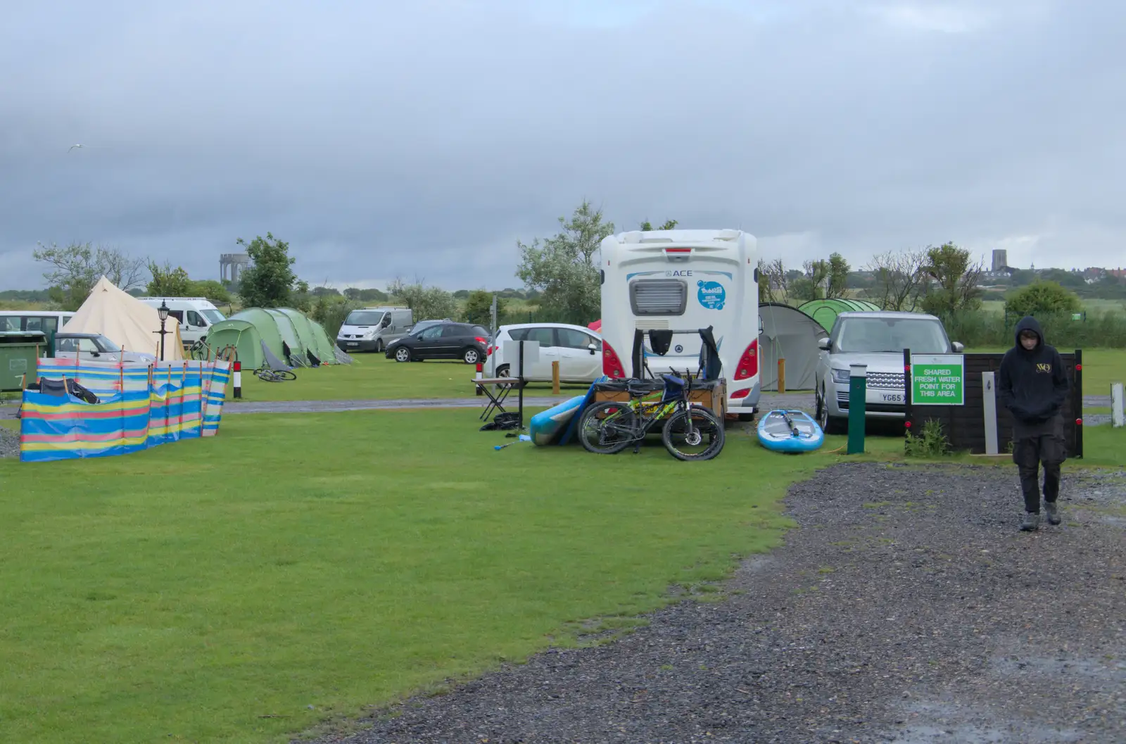 Fred roams around a wet campsite, from Eye Karate Kamp, Southwold Harbour, Suffolk - 6th July 2024