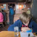 Harry scopes out the menu in the Harbour Inn, Eye Karate Kamp, Southwold Harbour, Suffolk - 6th July 2024