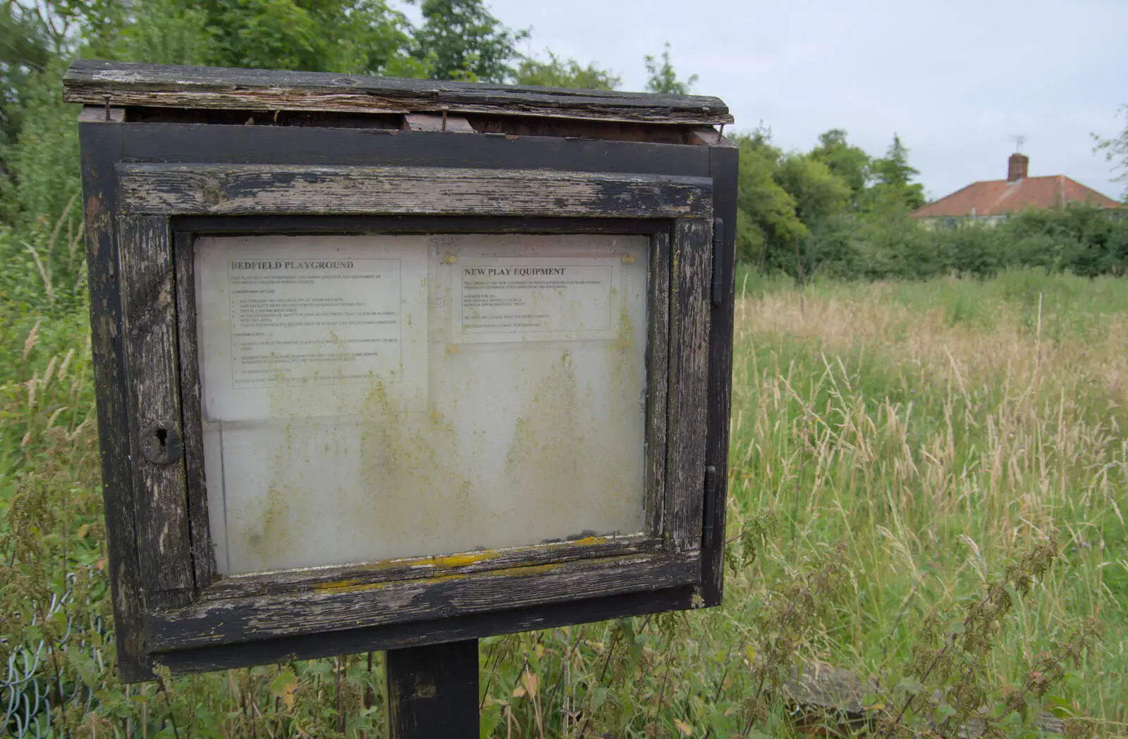 A sign for the old Bedfield playground, since moved, from A Return to Bedfield and the Church of St. Nicholas, Suffolk - 11th July 2024