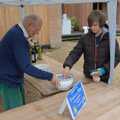 Harry has a go on the bottle stall, The Brome and Oakley Village Fête, Brome Hall, Suffolk - 13th July 2024