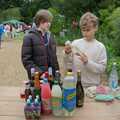 Christopher's won a huge stash of random drinks, The Brome and Oakley Village Fête, Brome Hall, Suffolk - 13th July 2024