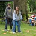 Fred and Sophie do the wooden ski walk thing, The Brome and Oakley Village Fête, Brome Hall, Suffolk - 13th July 2024