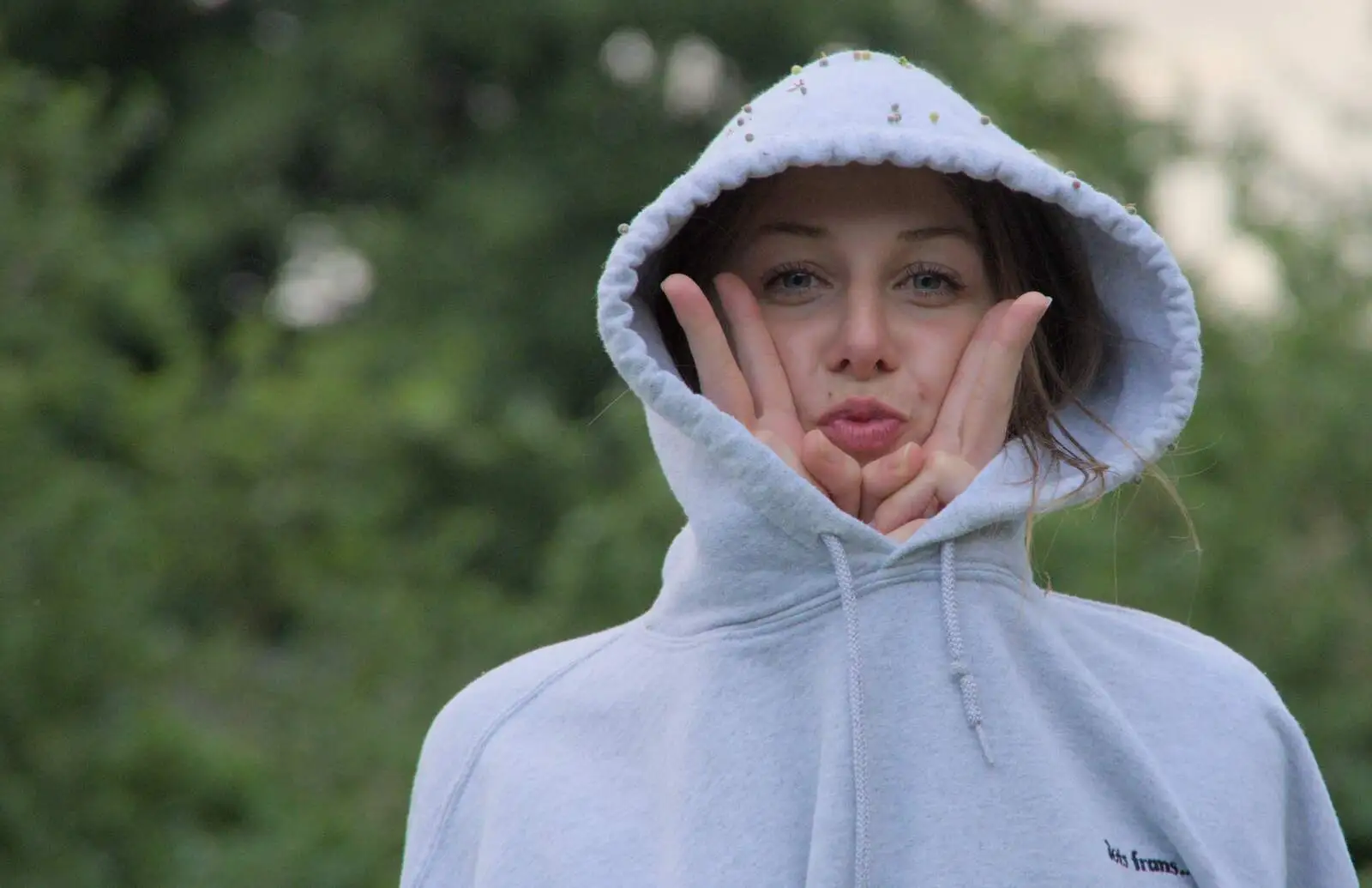 Sophie does an odd pose in her hoodie, from Lane's End Festival, Bressingham, Norfolk - 14th July 2024