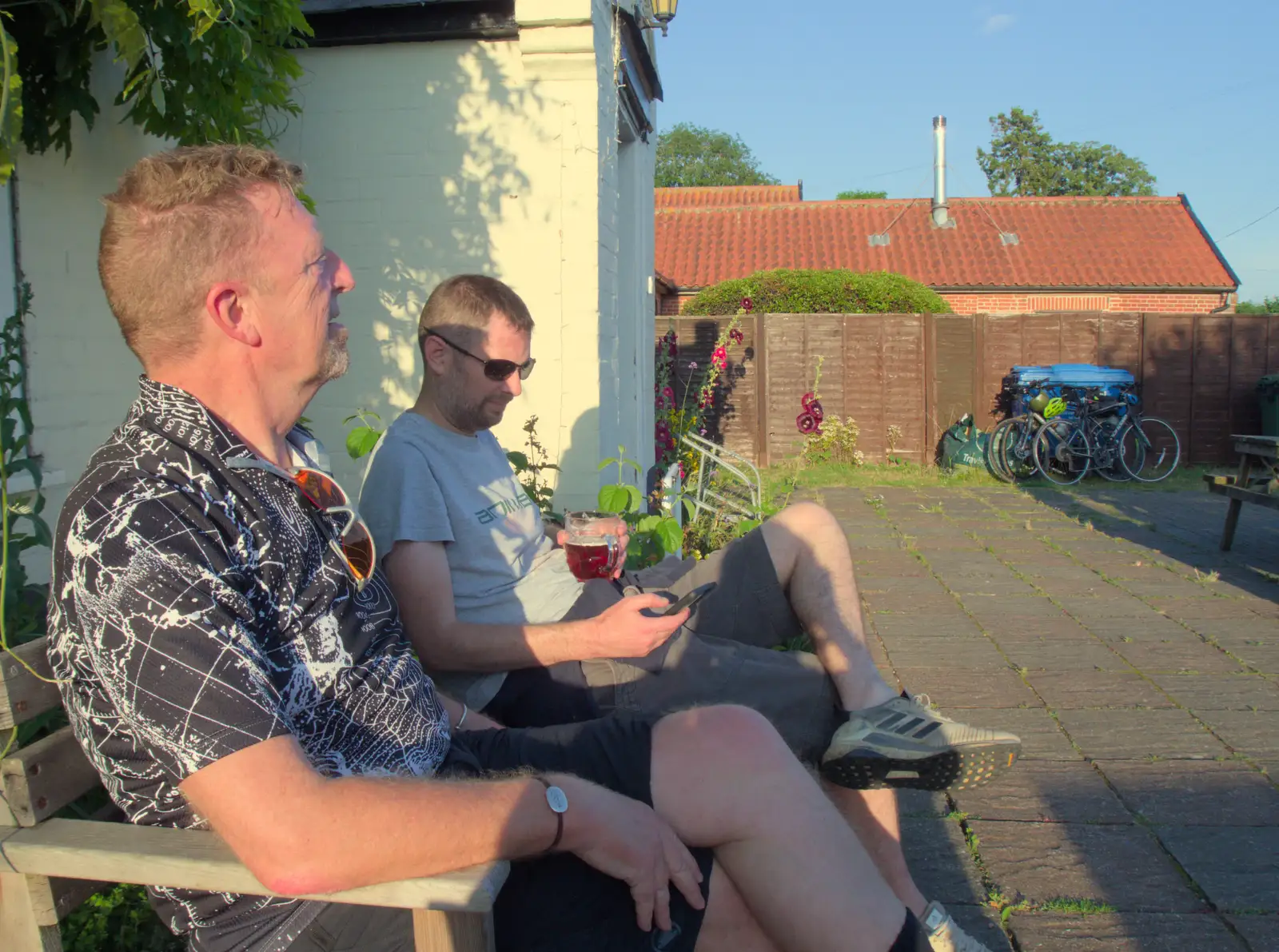 We sit outside the pub in the warm evening sun, from The BSCC at Gissing Crown and Thelnetham White Horse - 18th July 2024