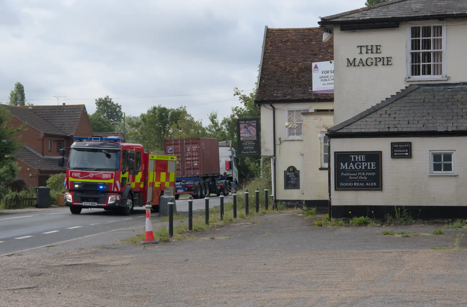 A fire engine rushes up the A140 at Stonham, from Isobel's Relatives Visit, Brome, Suffolk - 20th July 2024