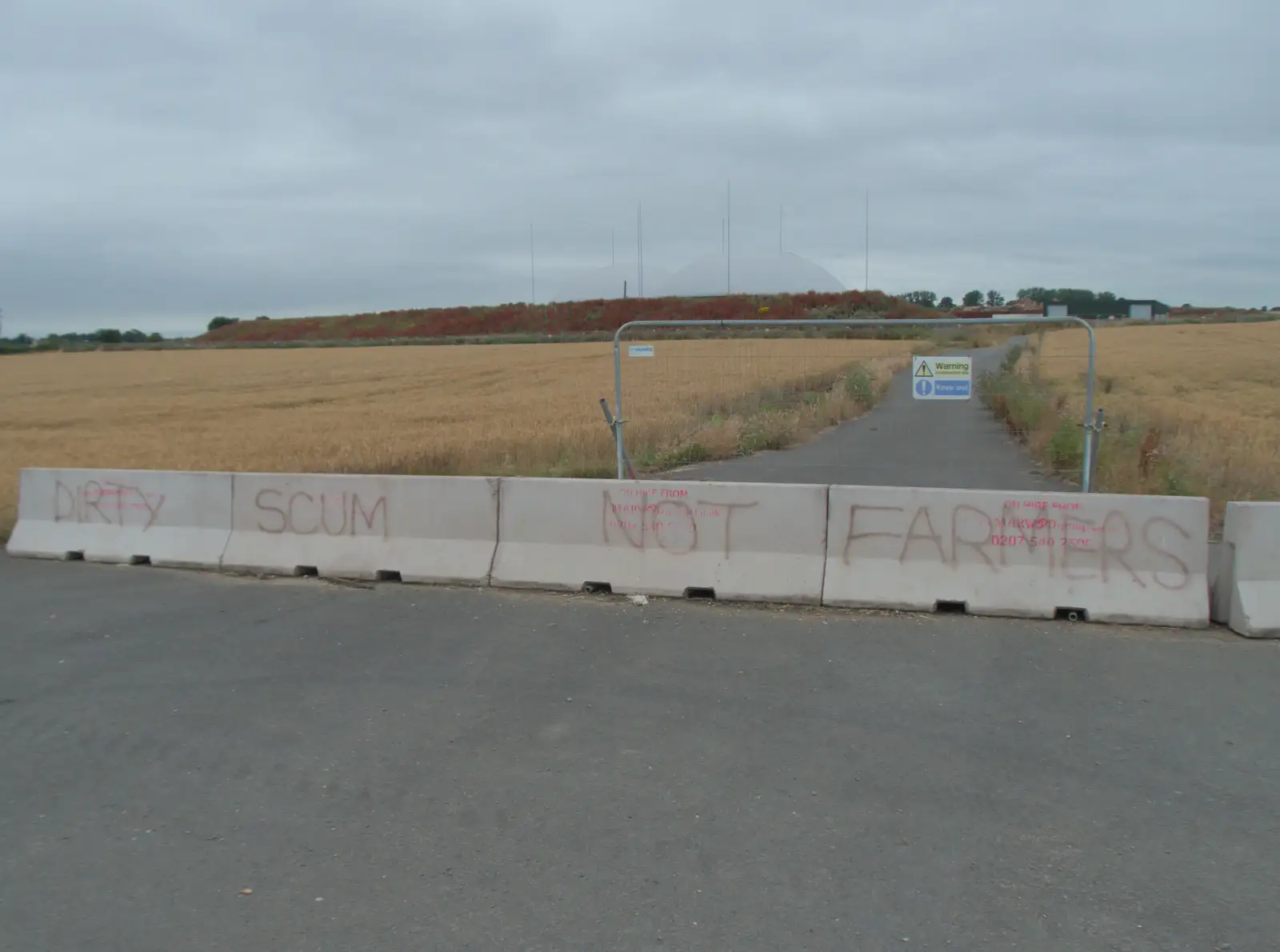 Protest graffiti at Deal Farm anaerobic digesters, from Harry at the Zoo, Banham, Norfolk - 28th July 2024