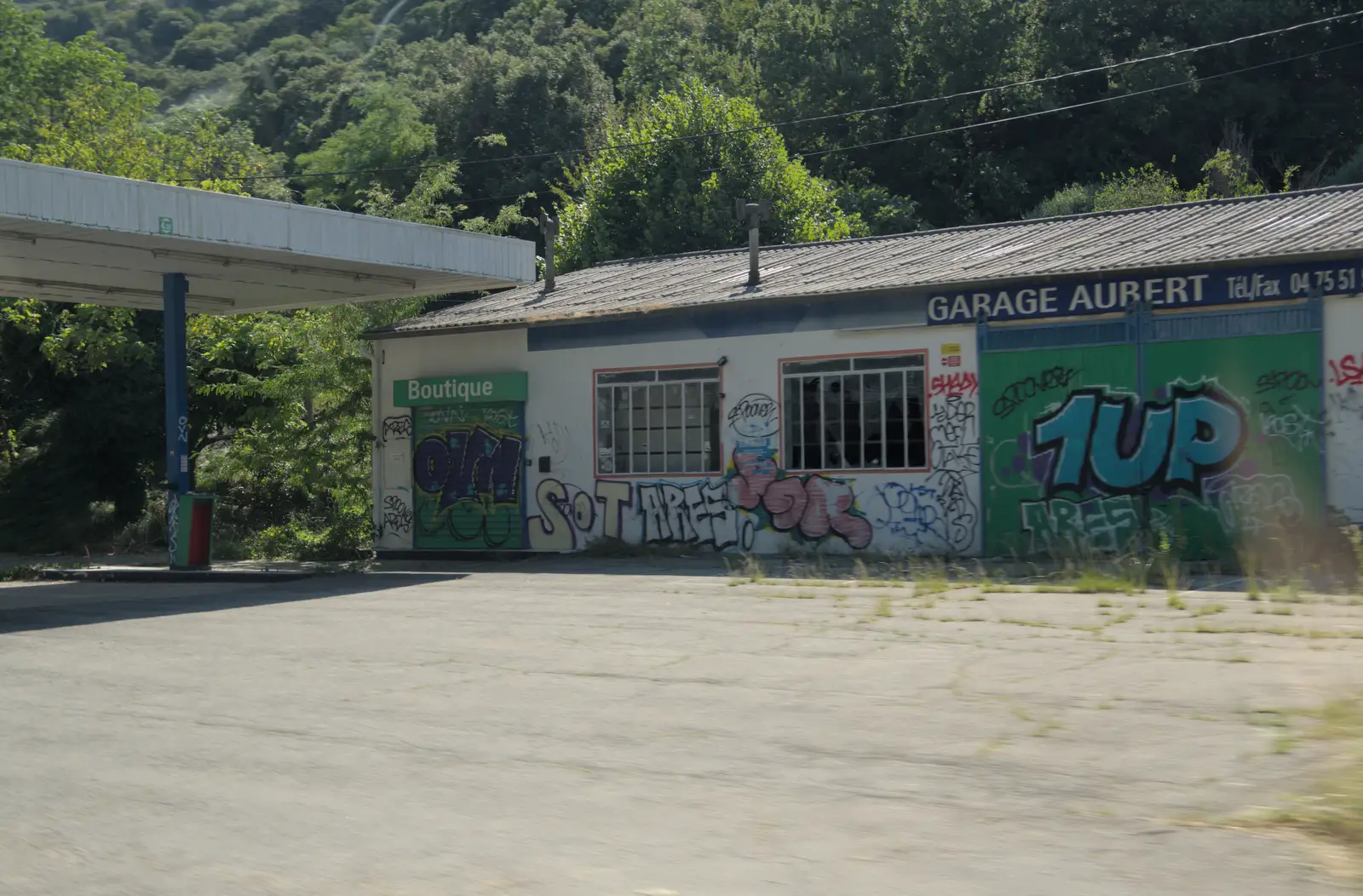 A derelict garage, from An Olympic Road Trip from Diss to Marseille, France - 3rd August 2024