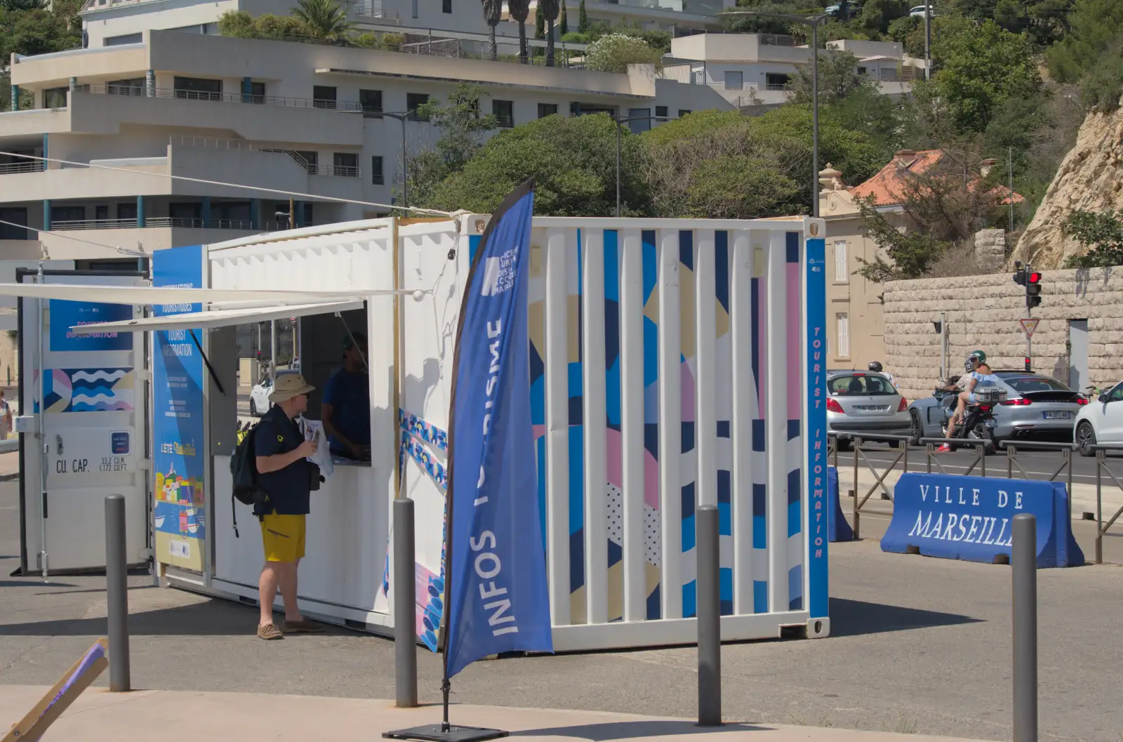 Hamish gets some tourist info, from Hannah and Olympic ILCA 6 Sailing, Marseille, France - 5th August 2024