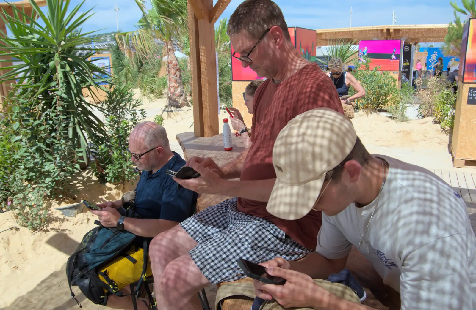 Everyone's on their phones, from Hannah and Olympic ILCA 6 Sailing, Marseille, France - 5th August 2024