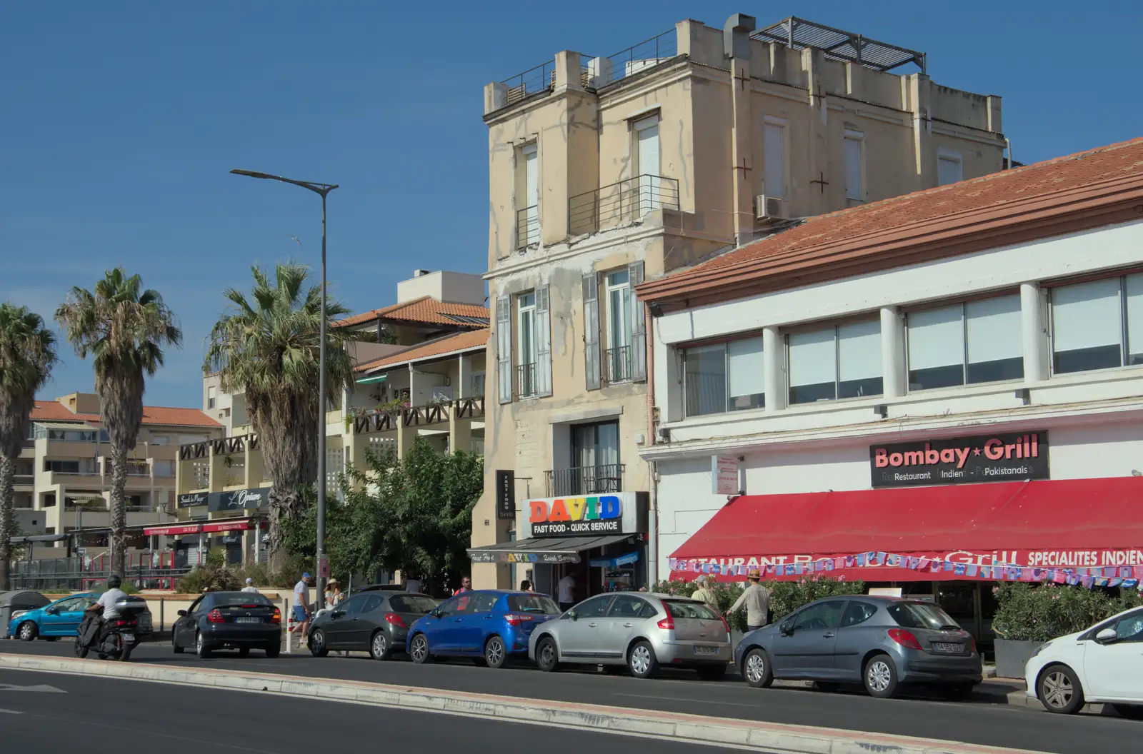 Seafront buildings on the Corniche Kennedy, from Hannah and Olympic ILCA 6 Sailing, Marseille, France - 5th August 2024