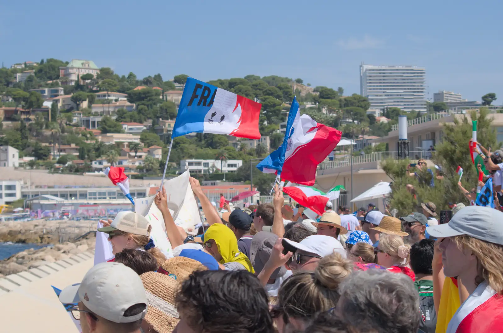 French flags fly in the crowd, from Hannah and Olympic ILCA 6 Sailing, Marseille, France - 5th August 2024