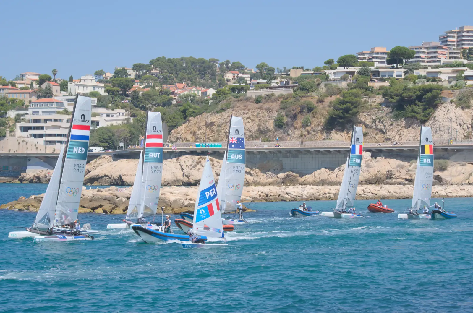 The multihulls follow the ILCAs out, from Hannah and Olympic ILCA 6 Sailing, Marseille, France - 5th August 2024