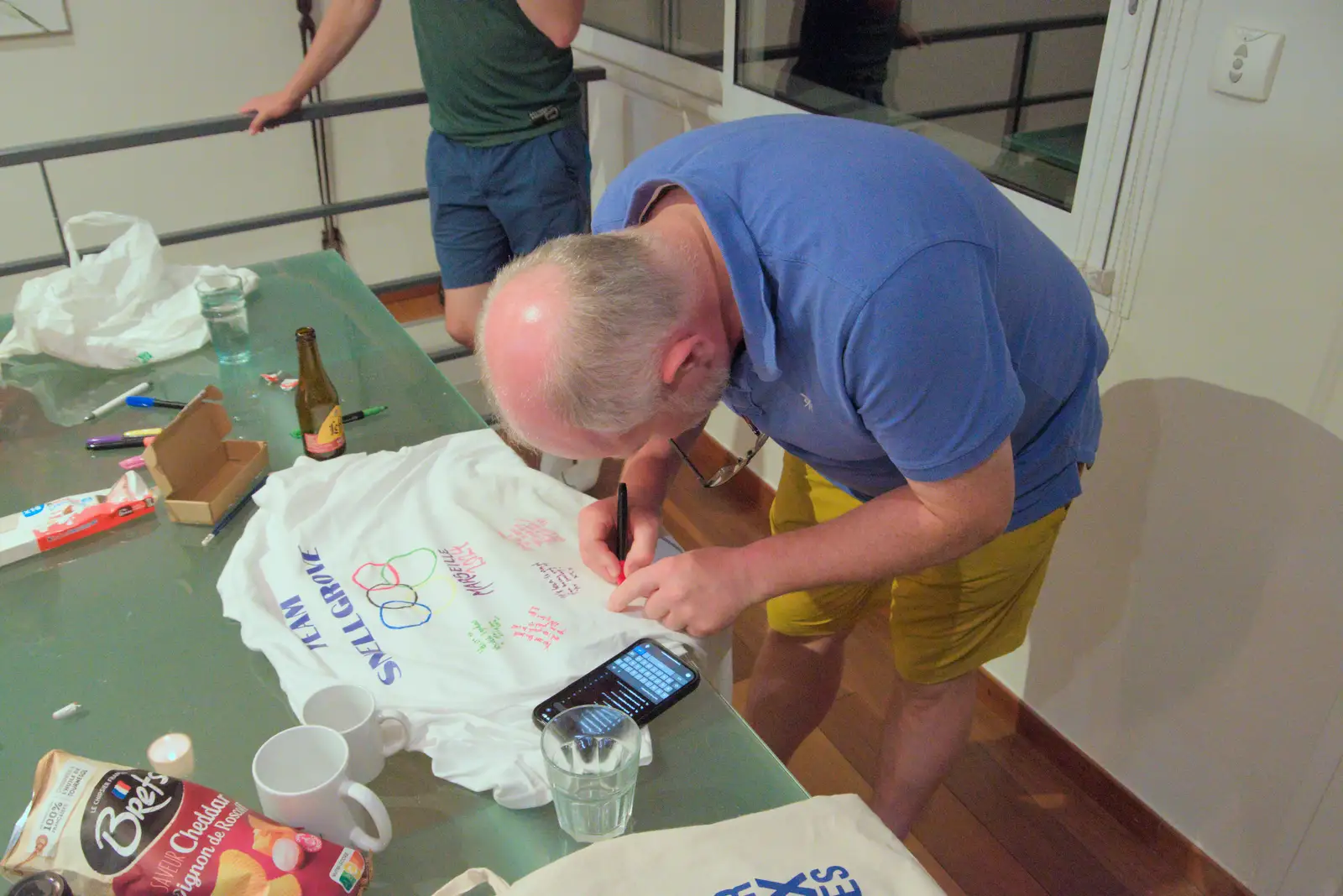 Hamish signs the teeshirt, from Hannah and Olympic ILCA 6 Sailing, Marseille, France - 5th August 2024