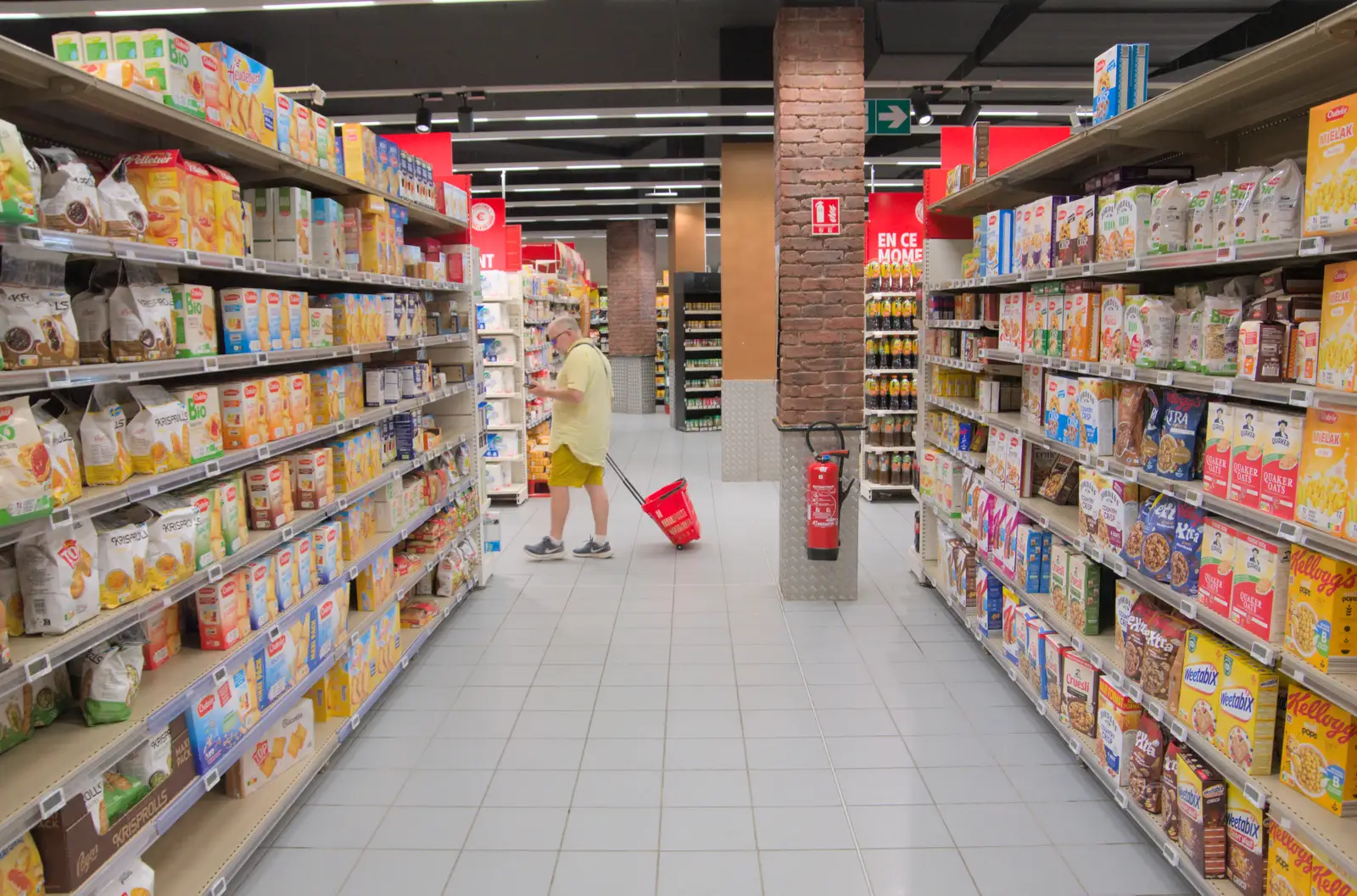 Hamish wanders the aisles looking for something, from Olympic Non-Sailing, Notre Dame, and the Journey Home, Marseille, France - 8th August 2024