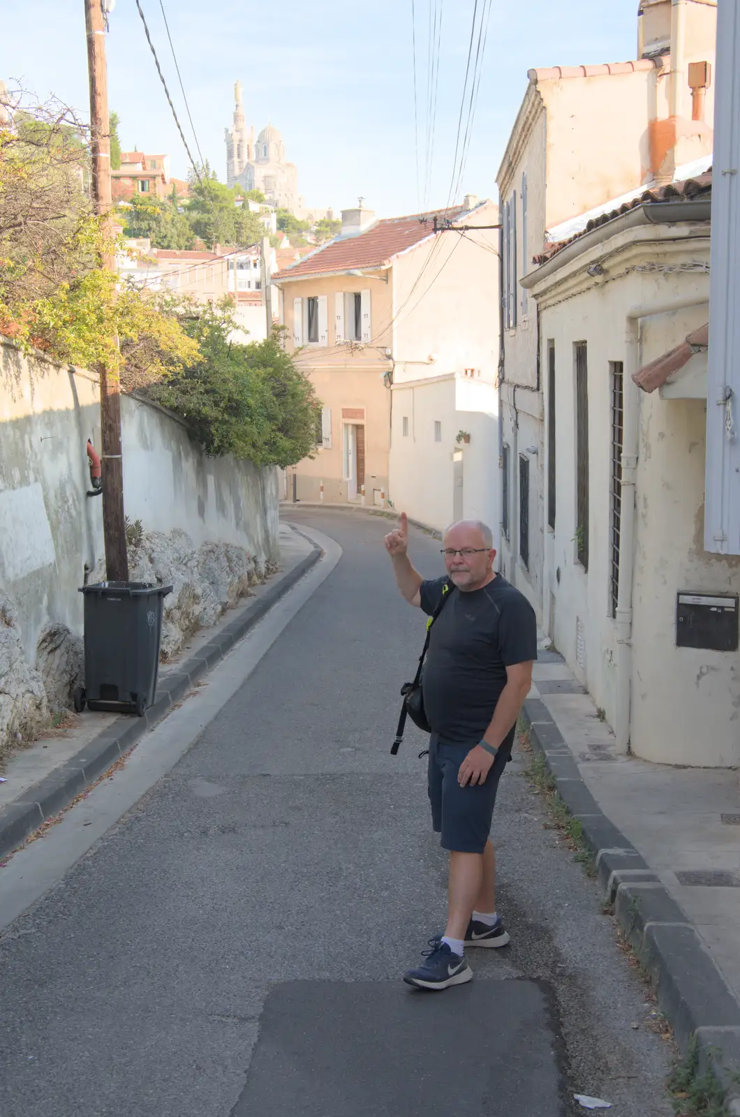 Hamish points up to our destination, from Olympic Non-Sailing, Notre Dame, and the Journey Home, Marseille, France - 8th August 2024