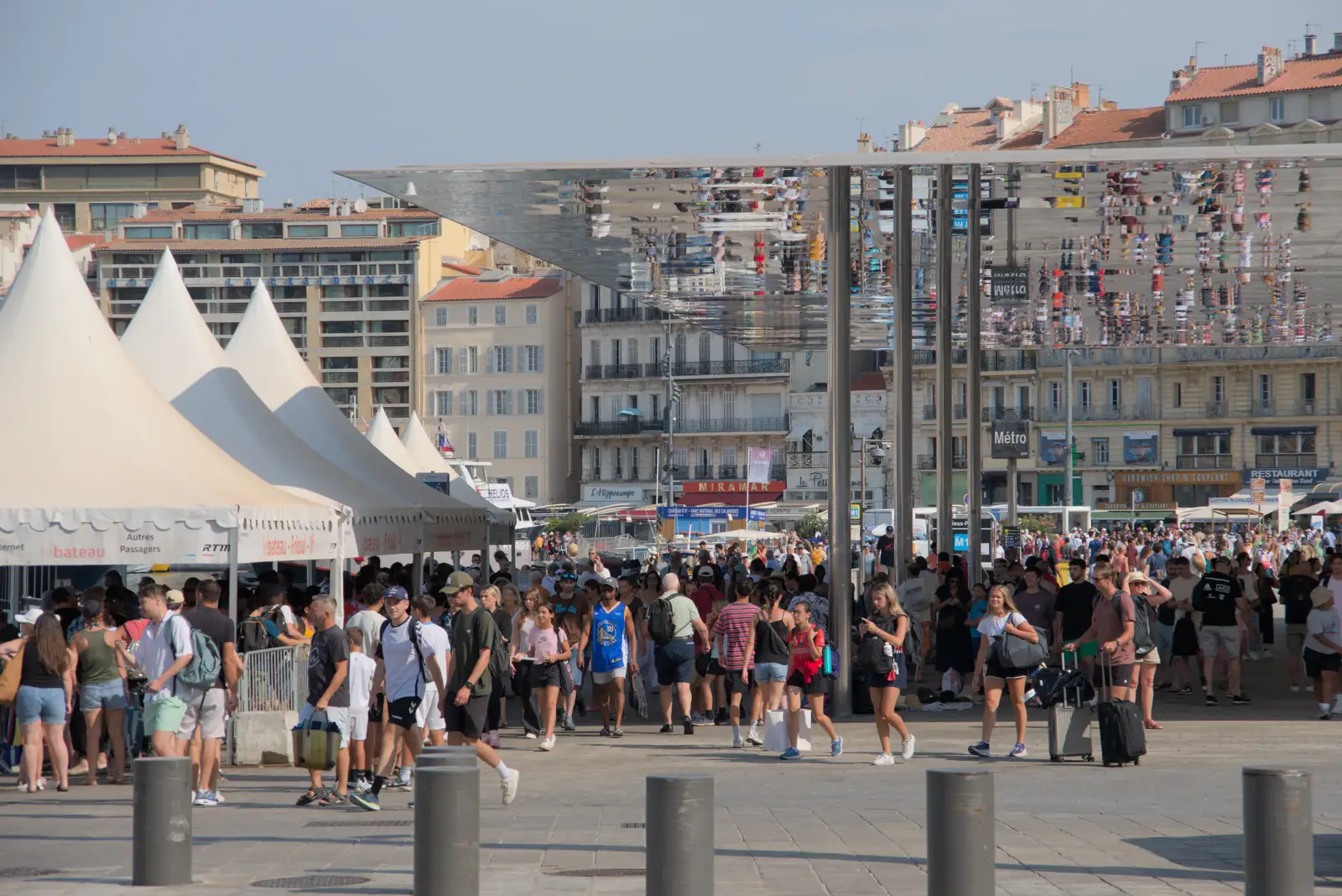 A throng of people is reflected on a shiny roof, from Olympic Non-Sailing, Notre Dame, and the Journey Home, Marseille, France - 8th August 2024