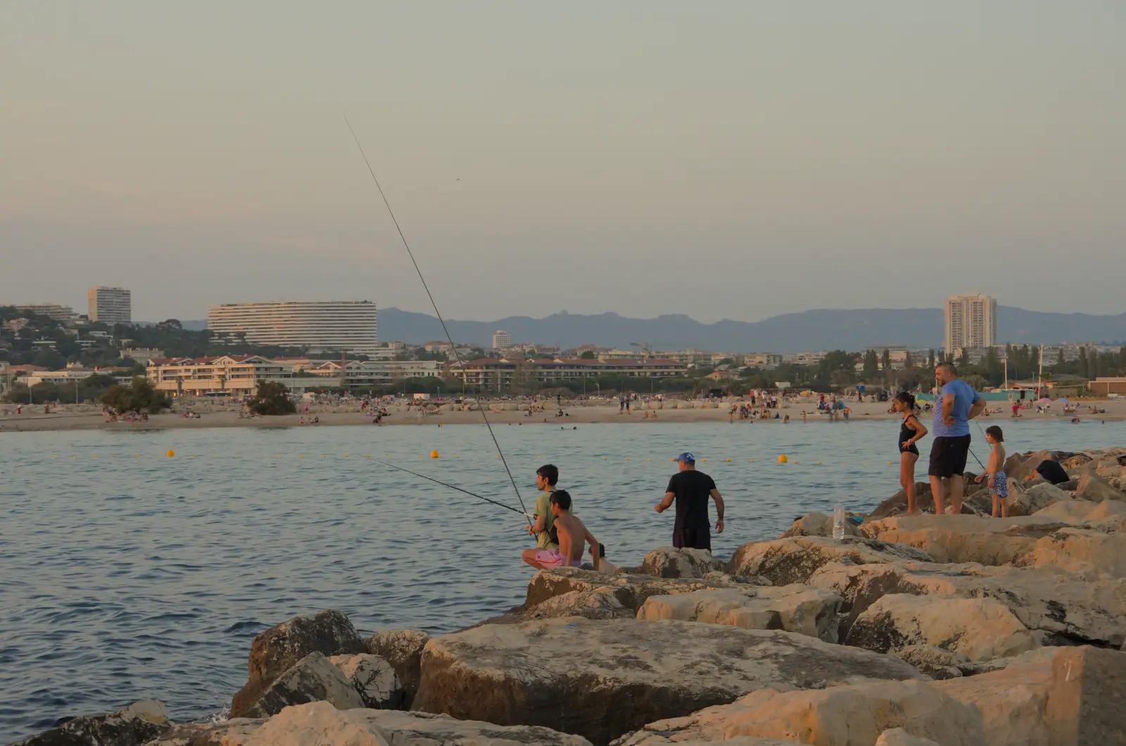 There's some fishing going on, from Olympic Non-Sailing, Notre Dame, and the Journey Home, Marseille, France - 8th August 2024