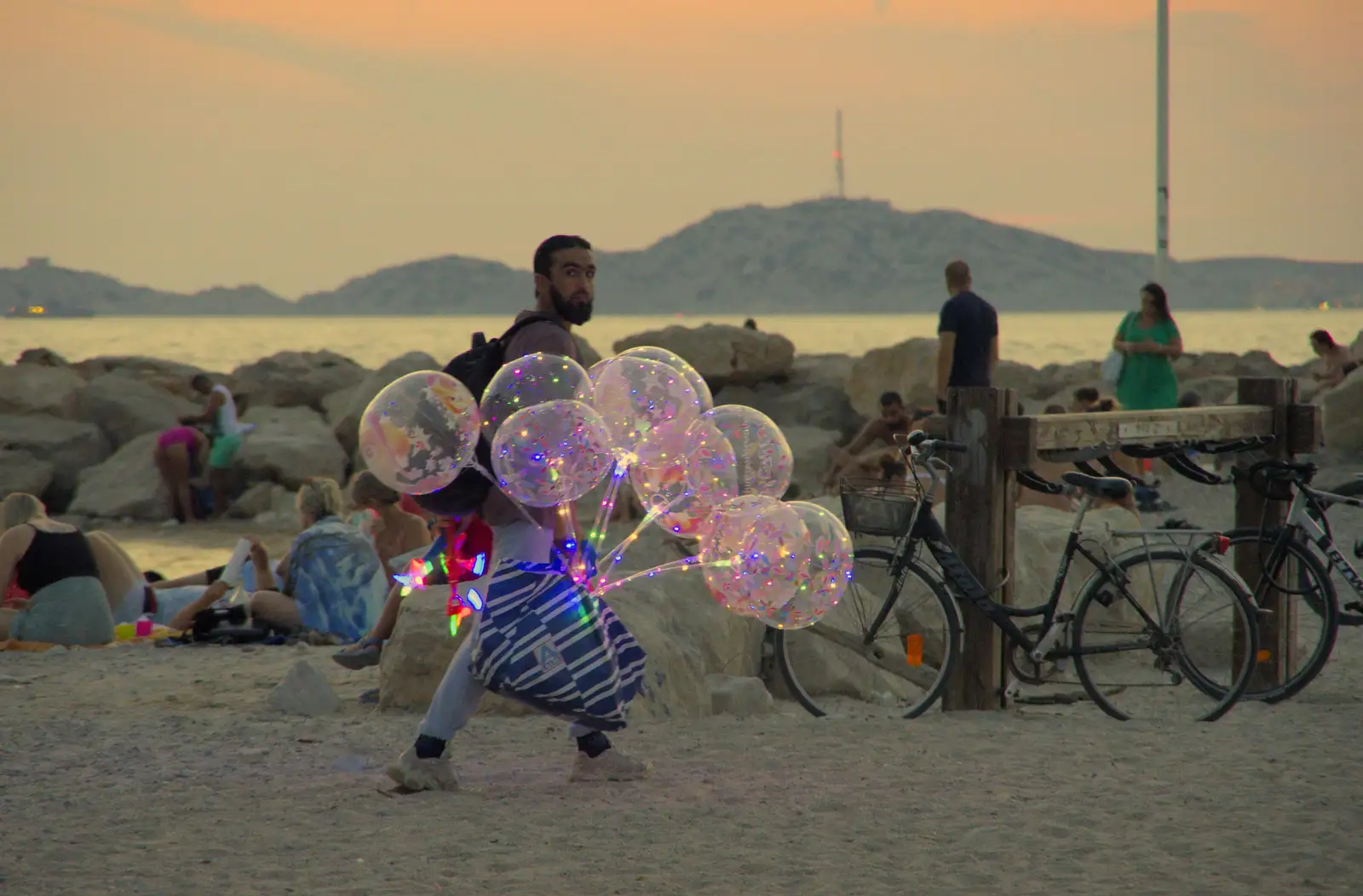 The illuminated balloon seller does the rounds, from Olympic Non-Sailing, Notre Dame, and the Journey Home, Marseille, France - 8th August 2024