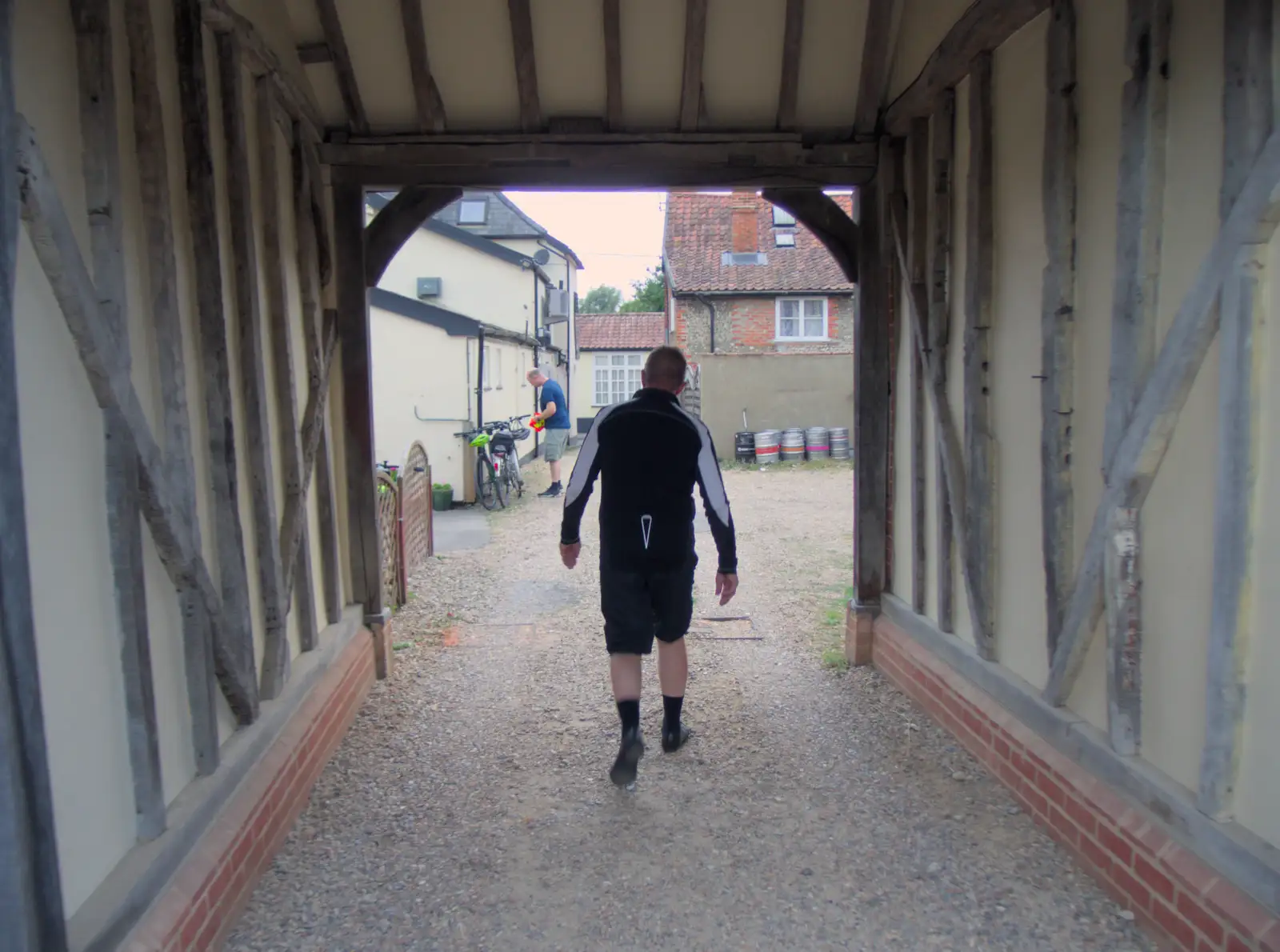 Gaz walks through the old timbered coaching arch, from Camping at Weybread, and the BSCC at Cotton and Dickleburgh - 14th August 2024