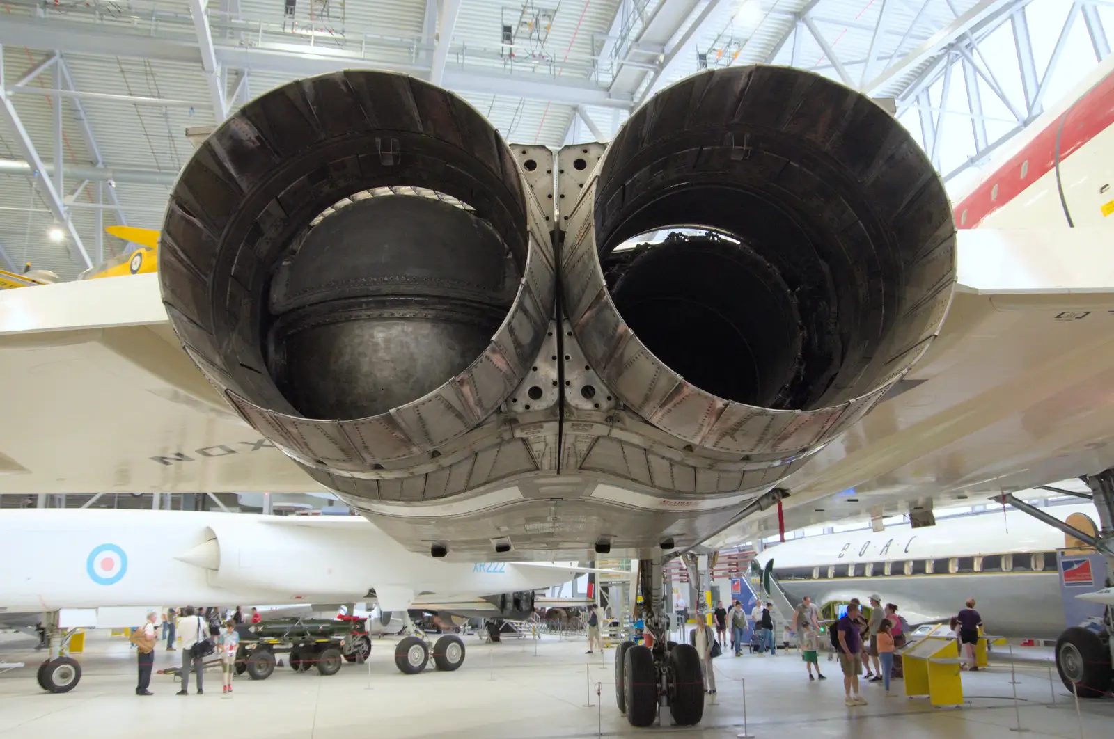 The exhaust ducts of a pair of Olympus engines, from Flying in a Dragon Rapide, IWM Duxford, Cambridgeshire - 17th August 2024