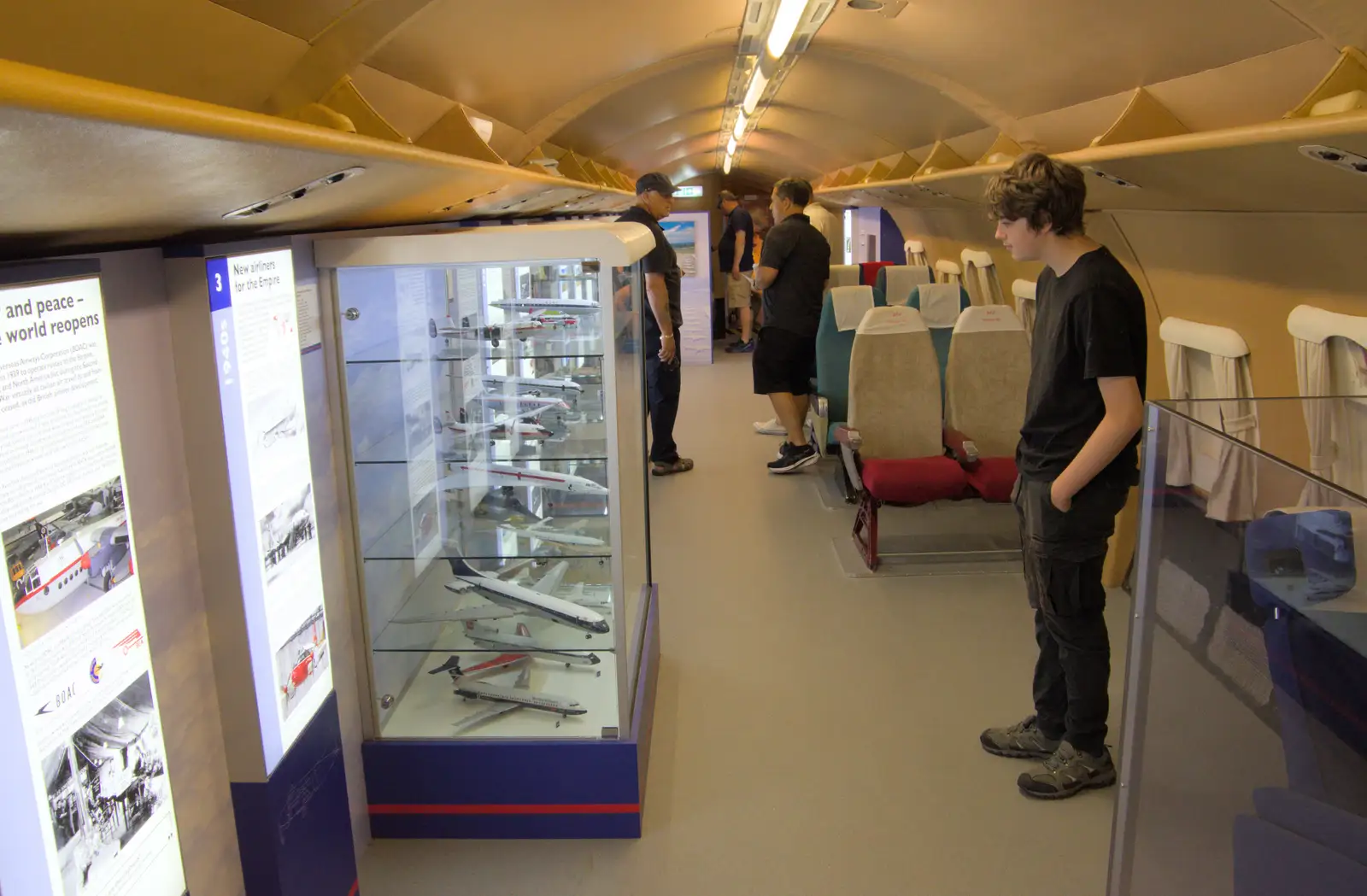 Fred looks at model aircraft, from Flying in a Dragon Rapide, IWM Duxford, Cambridgeshire - 17th August 2024